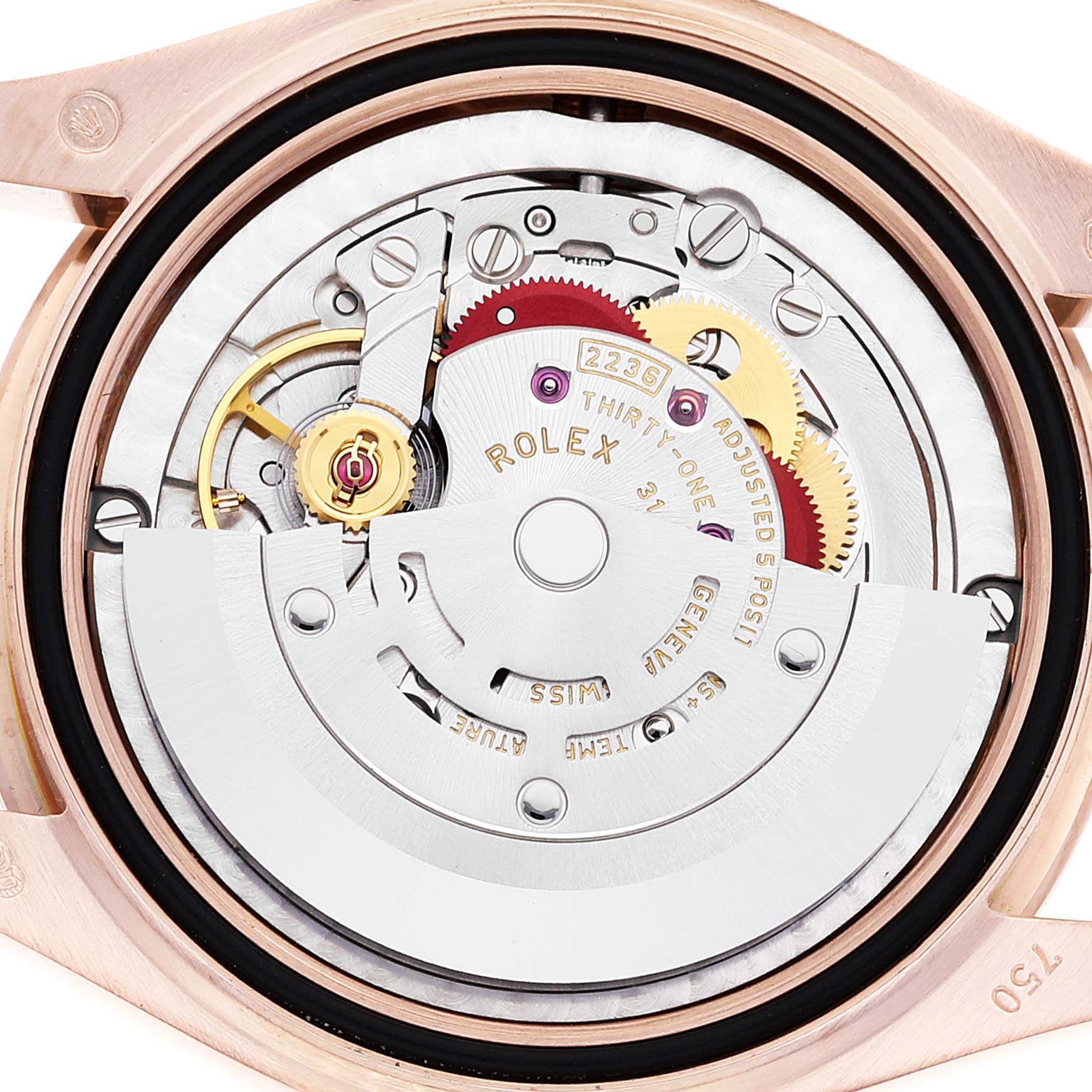 The image shows the inner mechanism of a Rolex President 278285 Women's Rose Gold Brown Dial 278285 Women's Rose Gold Brown Dial model watch from a back view, highlighting its movement and components.