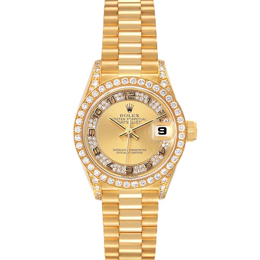 The Rolex President 69158 Women's Yellow Gold Champagne Dial watch is shown from a top-down angle, displaying its gold bracelet, diamond bezel, dial, and date window.