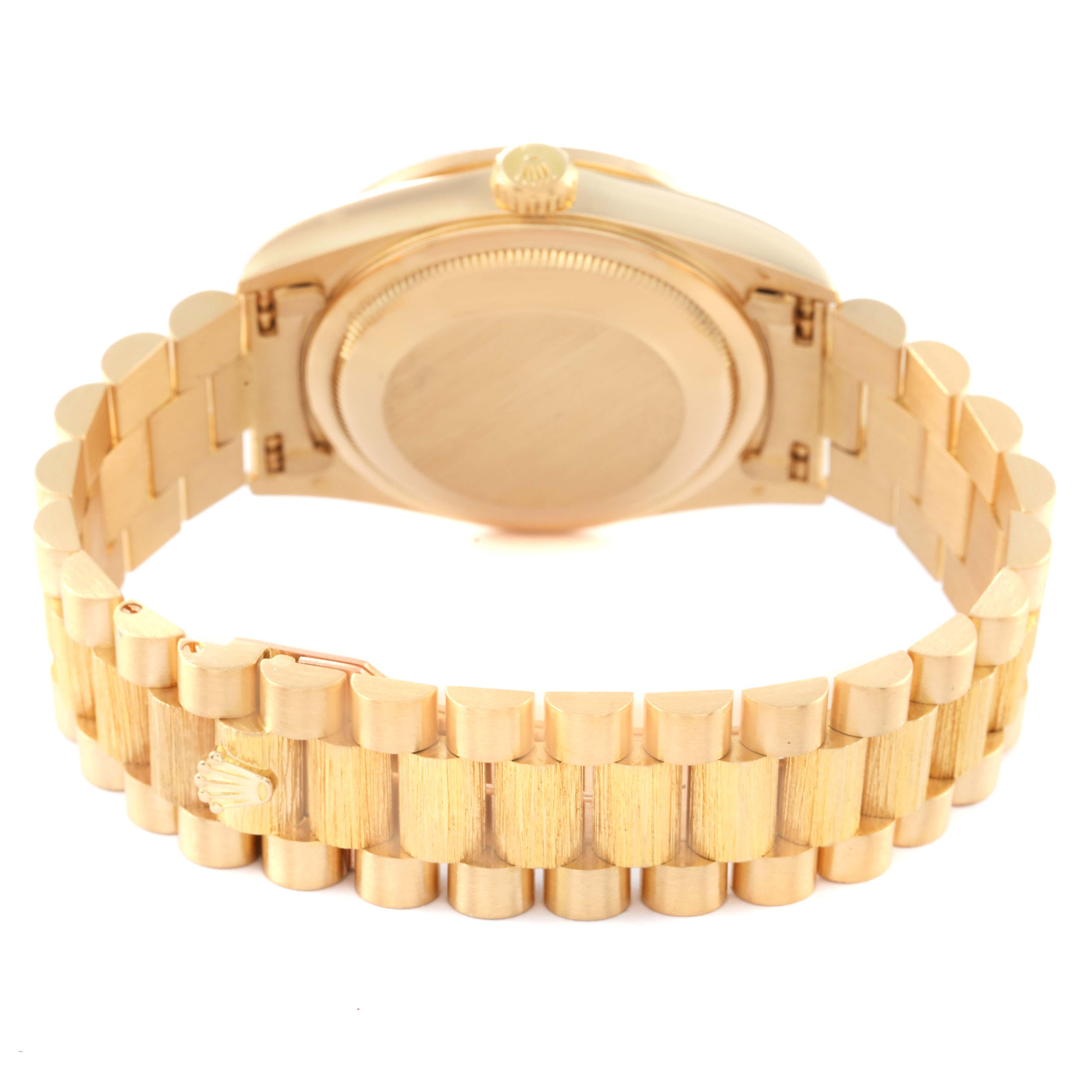 The image shows the back and bracelet of a Rolex President 18308 Men's Yellow Gold Champagne Dial 18308 Men's Yellow Gold Champagne Dial model watch.