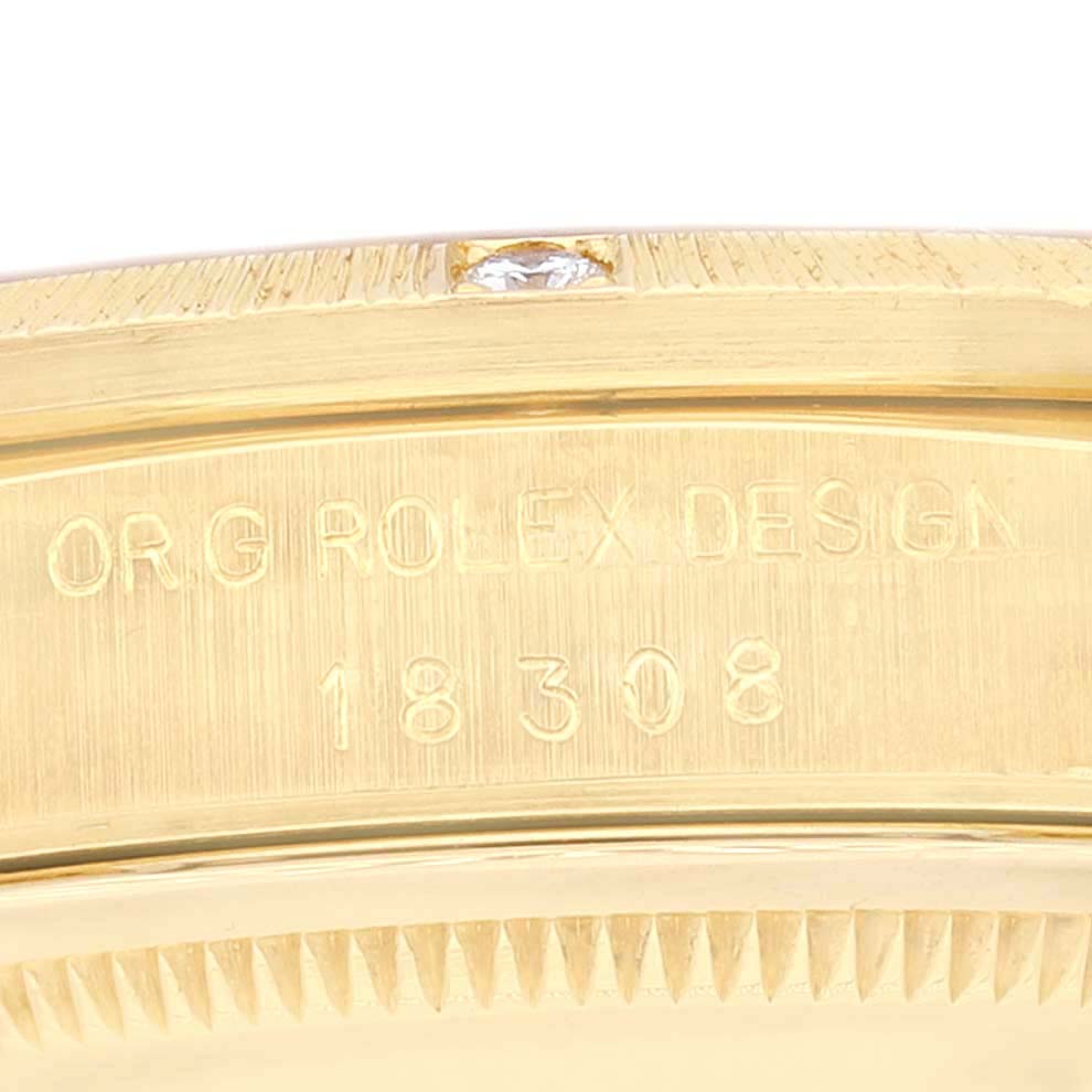 The image shows the side of the Rolex President 18308 Men's Yellow Gold Champagne Dial 18308 Men's Yellow Gold Champagne Dial model, focusing on the model number and "Org Rolex Design" engraving.