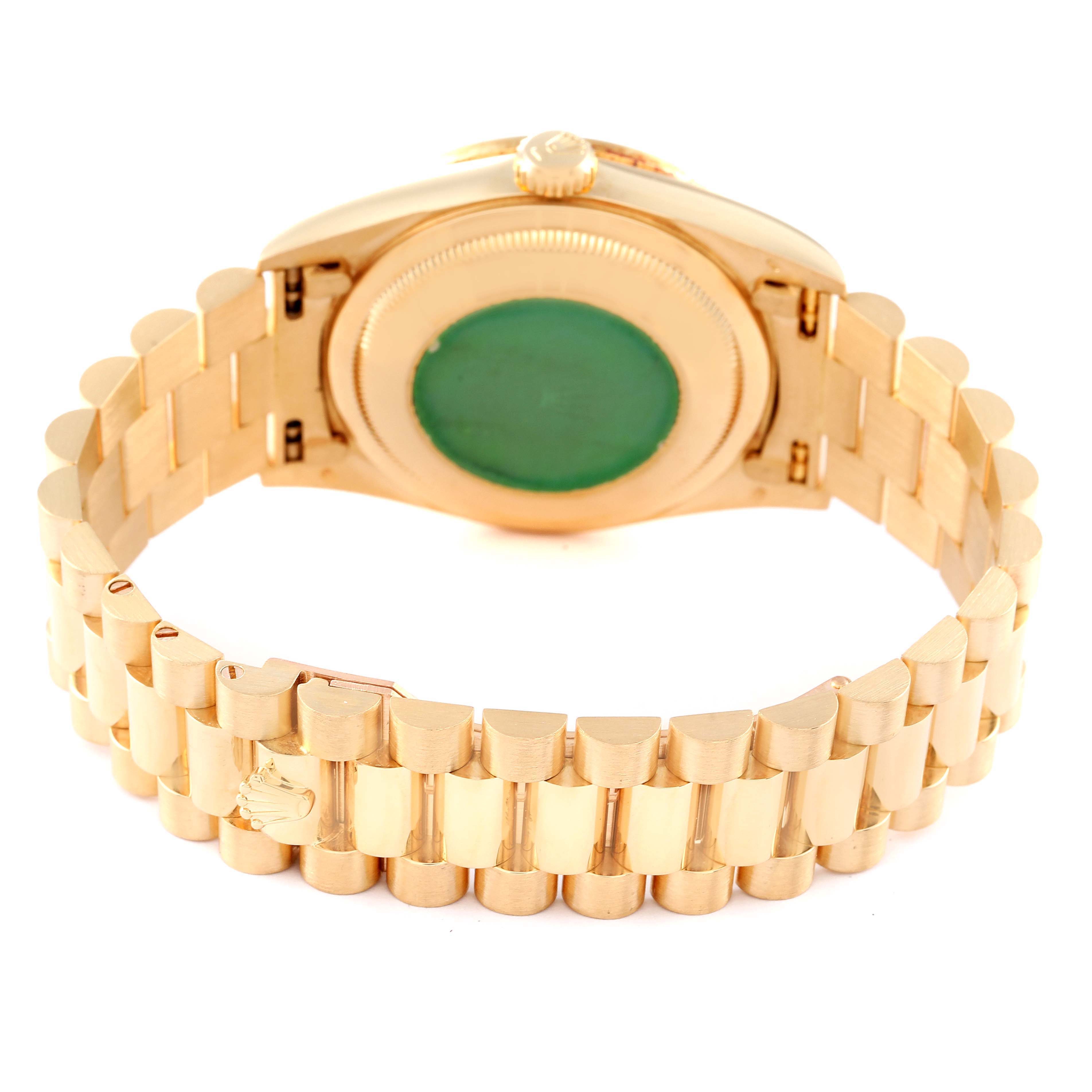 The image shows the back view of a Rolex President 18378 Men
s Yellow Gold Champagne Dial 18378 Men
s Yellow Gold Champagne Dial model watch, highlighting its gold bracelet and case back.