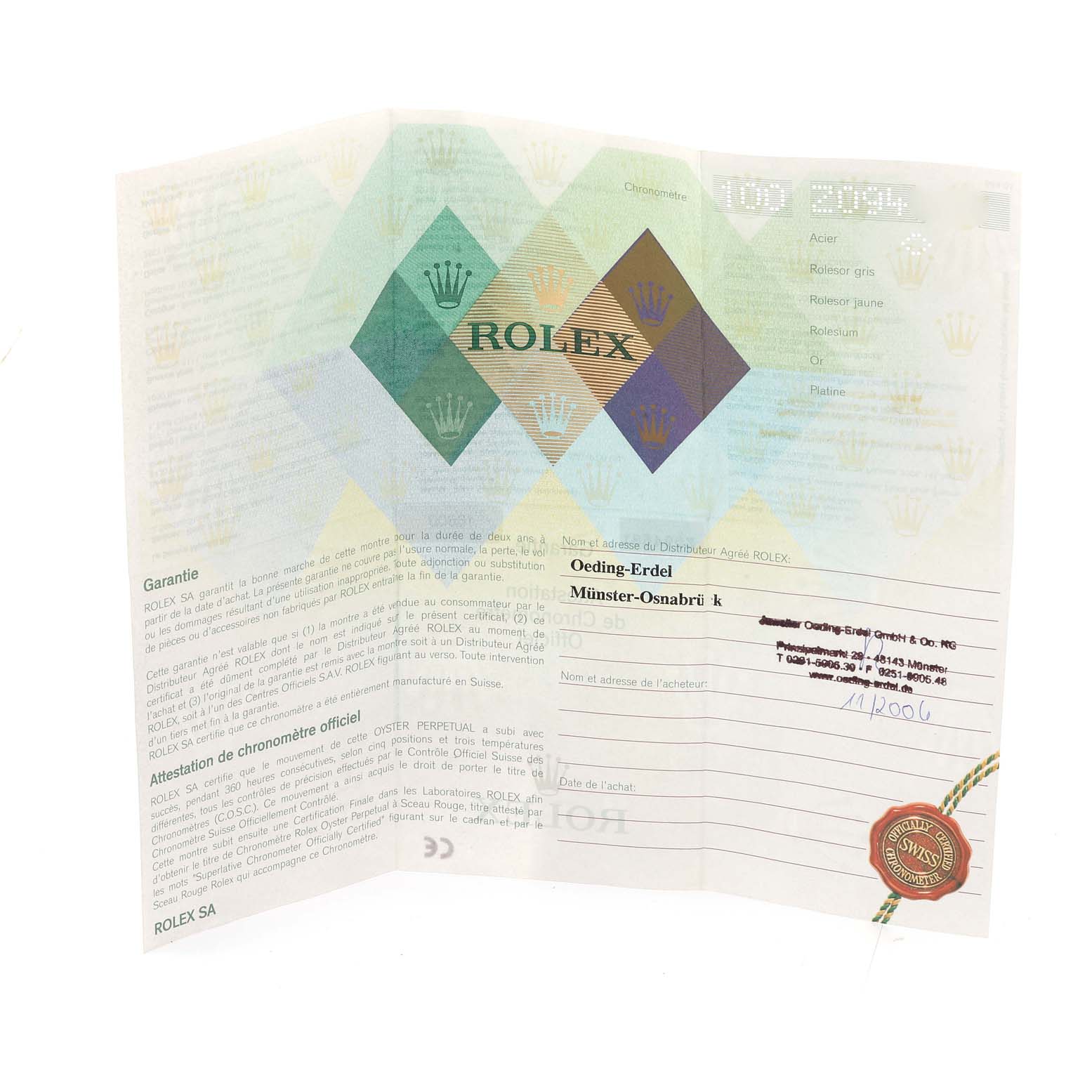 The image shows a warranty card for the Rolex Sea-Dweller 16600 Men
s Stainless Steel Black Dial 16600 Men
s Stainless Steel Black Dial watch, displaying details and an official Rolex seal.