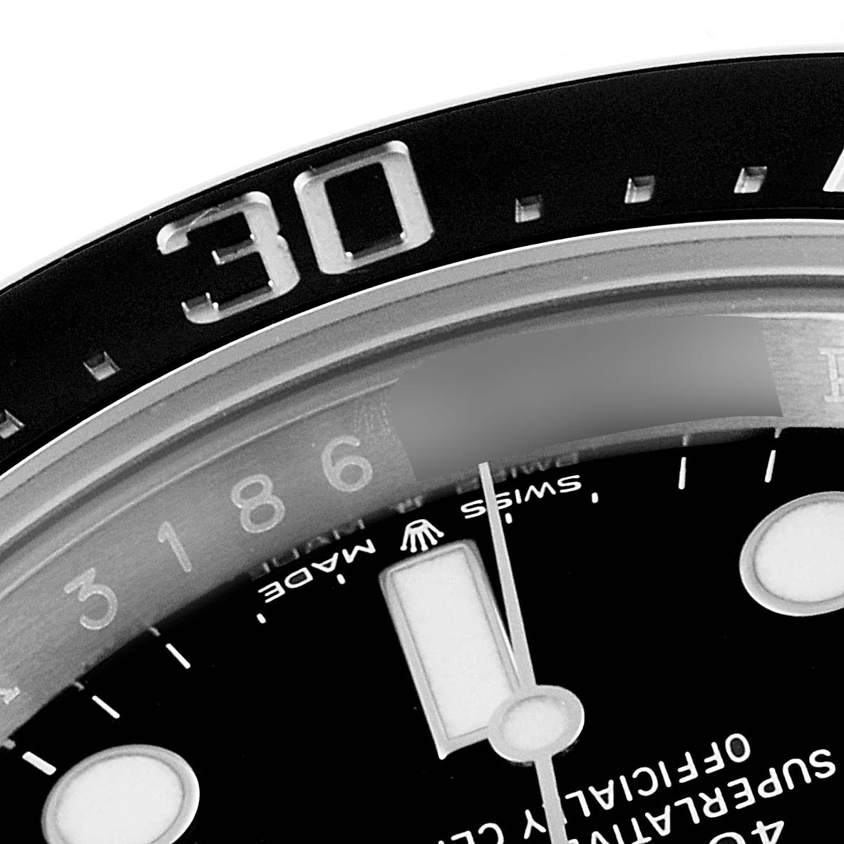 The image shows a close-up of the bezel and part of the dial of a Rolex Sea-Dweller 126600 Men
s Stainless Steel Black Dial 126600 Men
s Stainless Steel Black Dial watch, viewed from an angled top perspective.