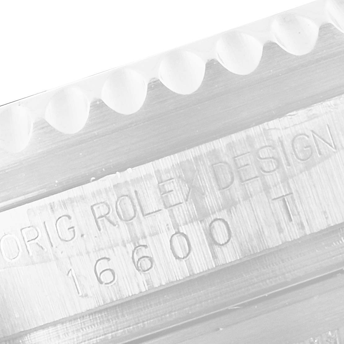 The image shows a close-up of the case side and bezel of a Rolex Sea-Dweller 16600 Men
s Stainless Steel Black Dial 16600 Men
s Stainless Steel Black Dial watch, highlighting the model number 16600.