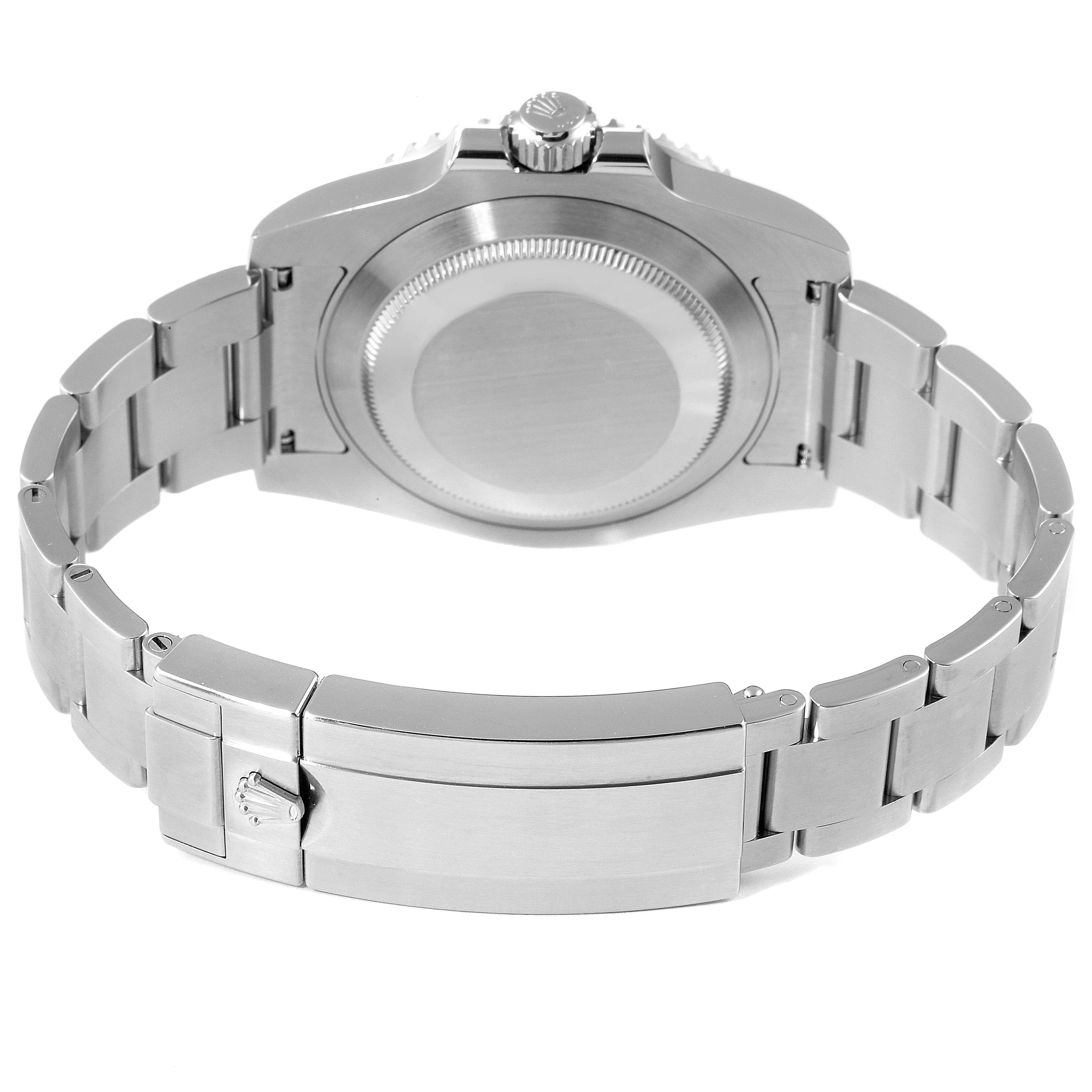 The image shows the back case and bracelet clasp of a Rolex Submariner 114060 Men
s Stainless Steel Black Dial 114060 Men
s Stainless Steel Black Dial watch from a rear angle.