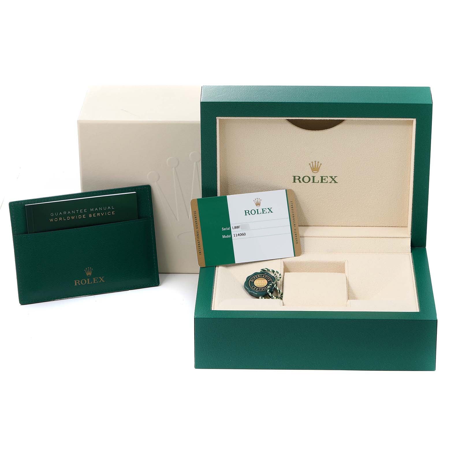 The image shows the packaging, guarantee manual, and warranty card for the Rolex Submariner 114060 Men
s Stainless Steel Black Dial 114060 Men
s Stainless Steel Black Dial model.
