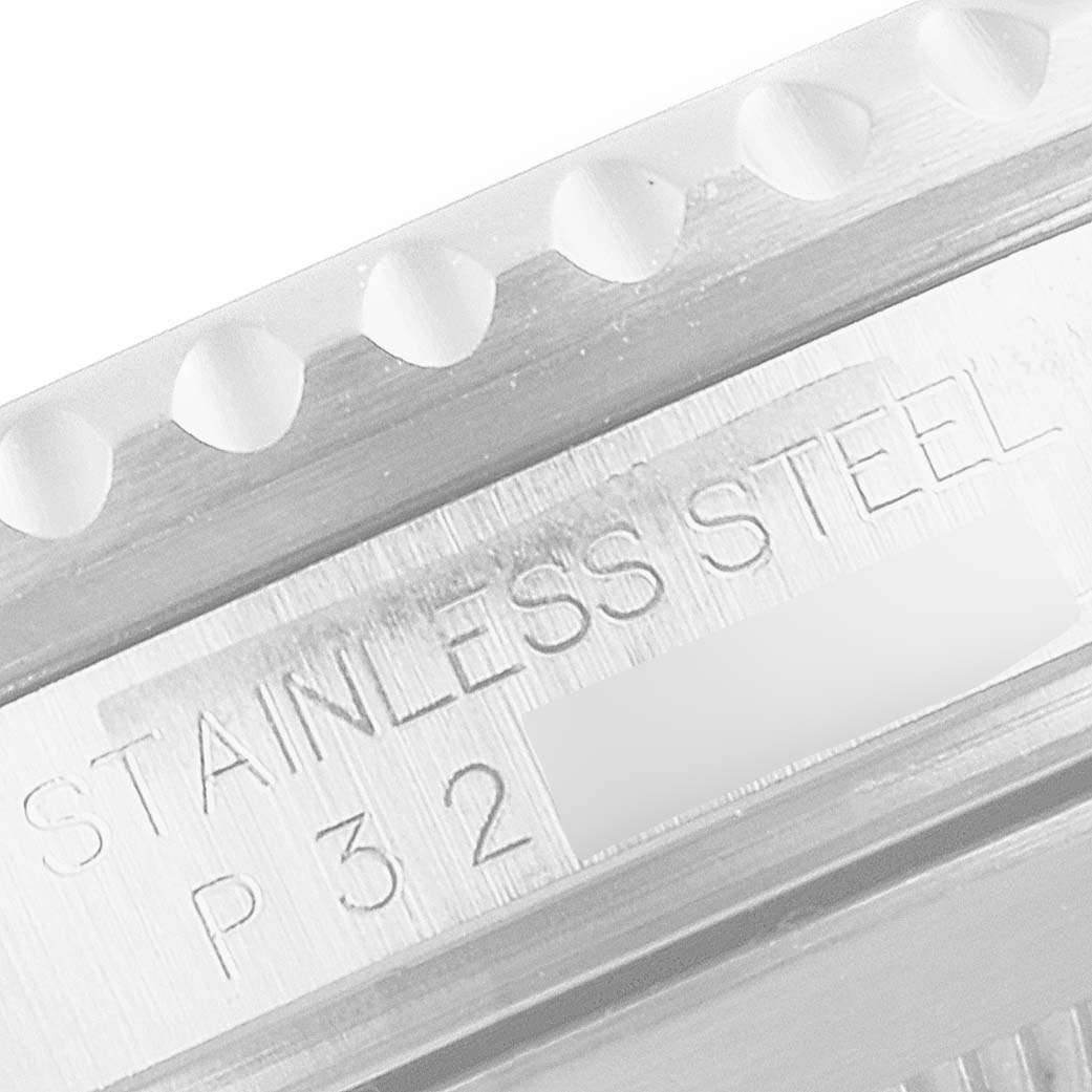 This image shows a close-up view of the side engraving on a Rolex Submariner 16610 Men
s Stainless Steel Black Dial 16610 Men
s Stainless Steel Black Dial, highlighting the "STAINLESS STEEL" text.