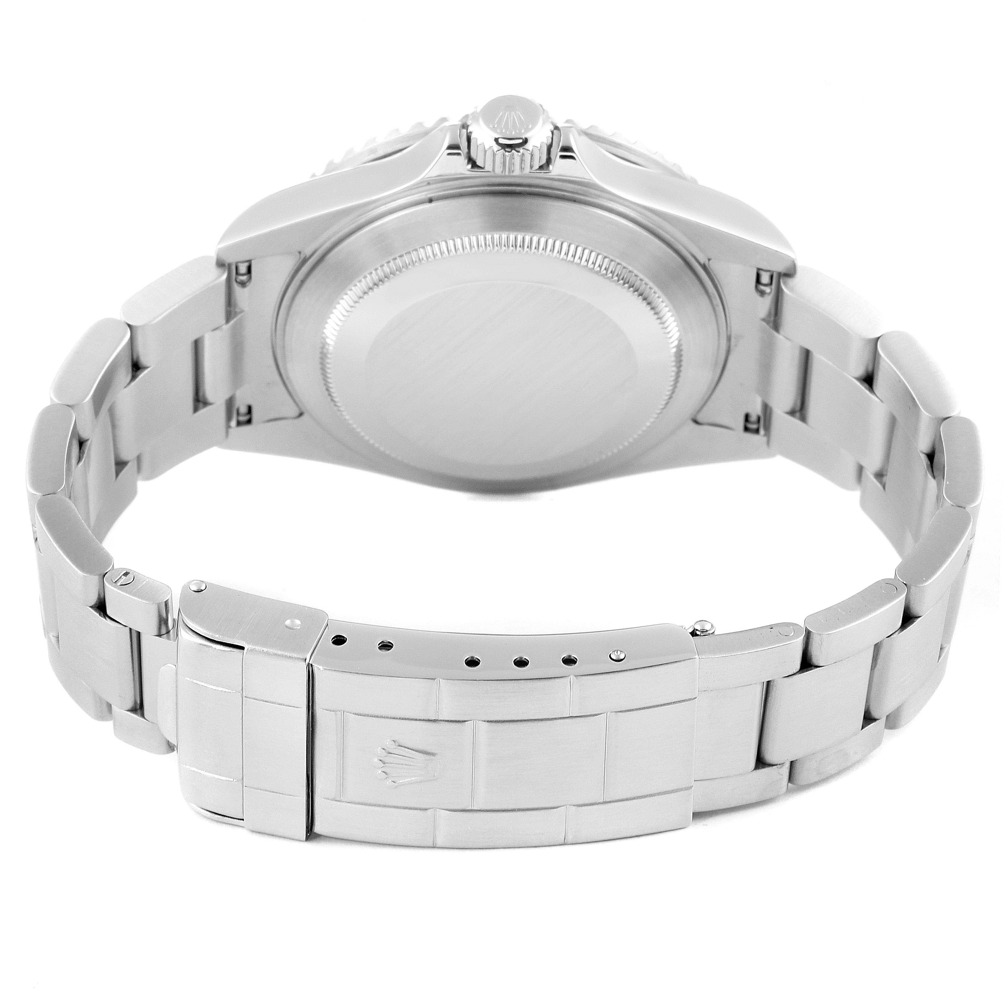 This is a rear view of a Rolex Submariner 16610 Men
s Stainless Steel Black Dial 16610 Men
s Stainless Steel Black Dial watch, showcasing its case back, crown, and bracelet with the clasp.