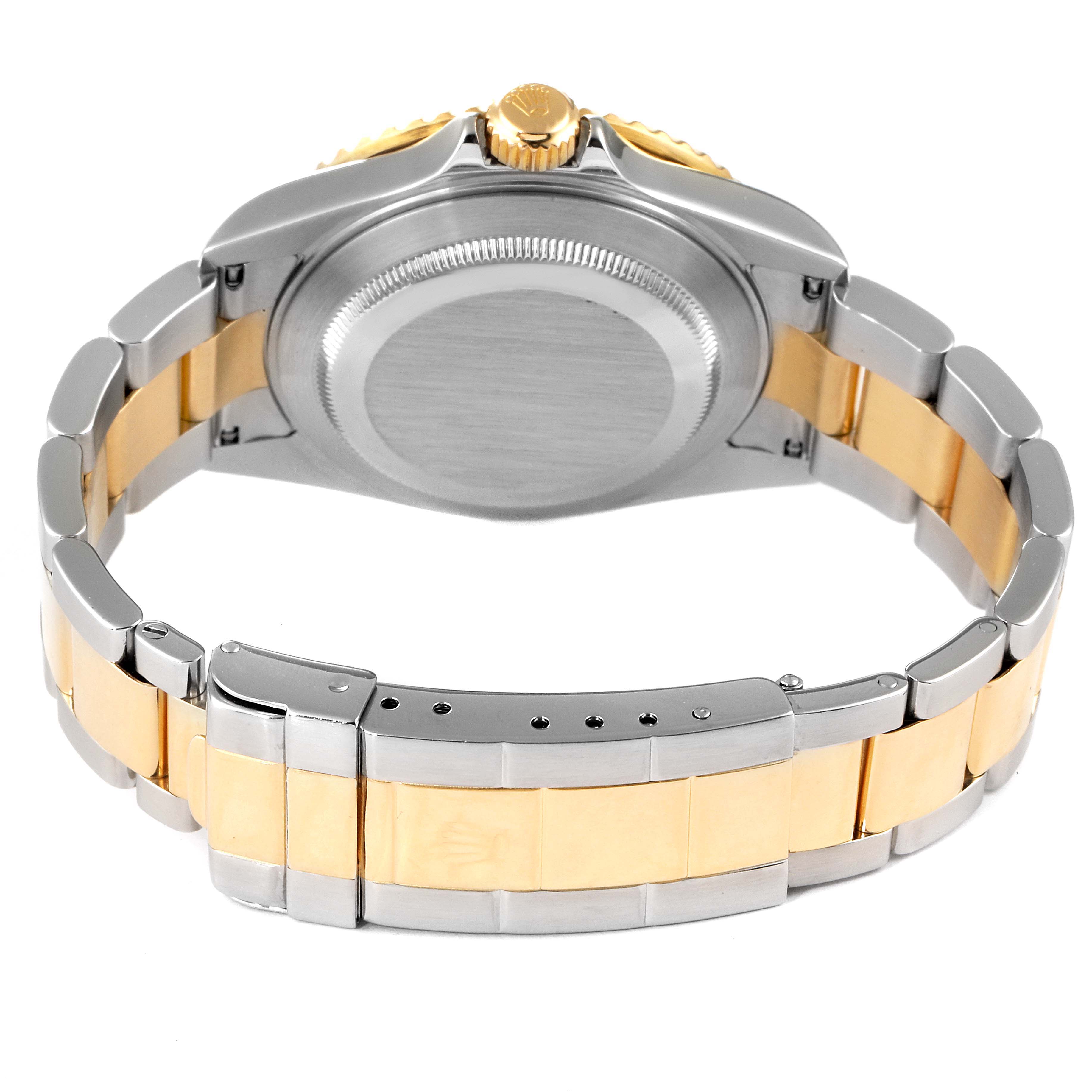 This image shows the back case and bracelet of a Rolex Submariner 16613 Men's Steel and Gold (two tone) Champagne Dial 16613 Men's Steel and Gold (two tone) Champagne Dial watch, emphasizing the clasp and crown.