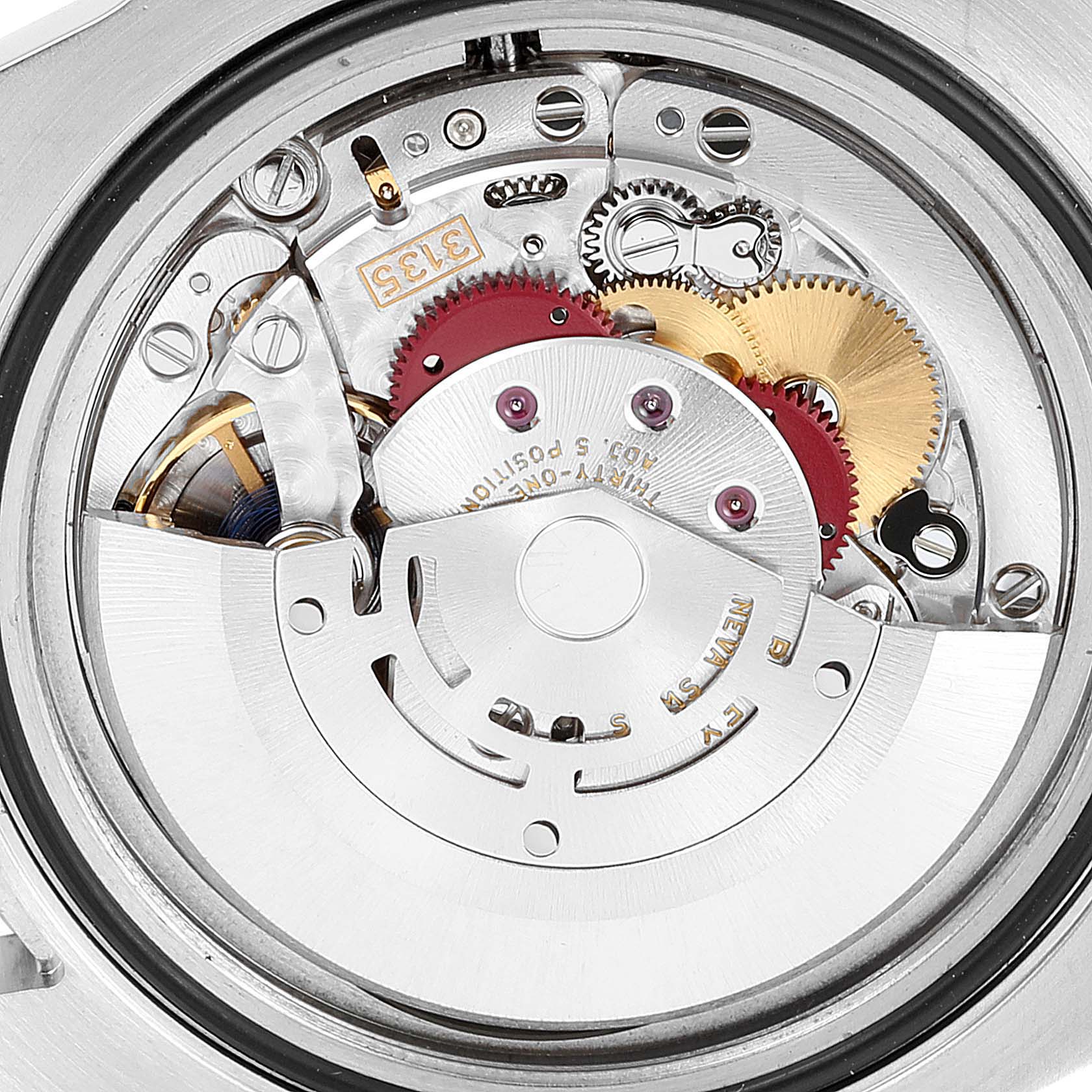 This image shows the intricate internal mechanism of the Rolex Submariner 116613 Men's Steel and Gold (two tone) Black Dial 116613 Men's Steel and Gold (two tone) Black Dial watch viewed from the back.