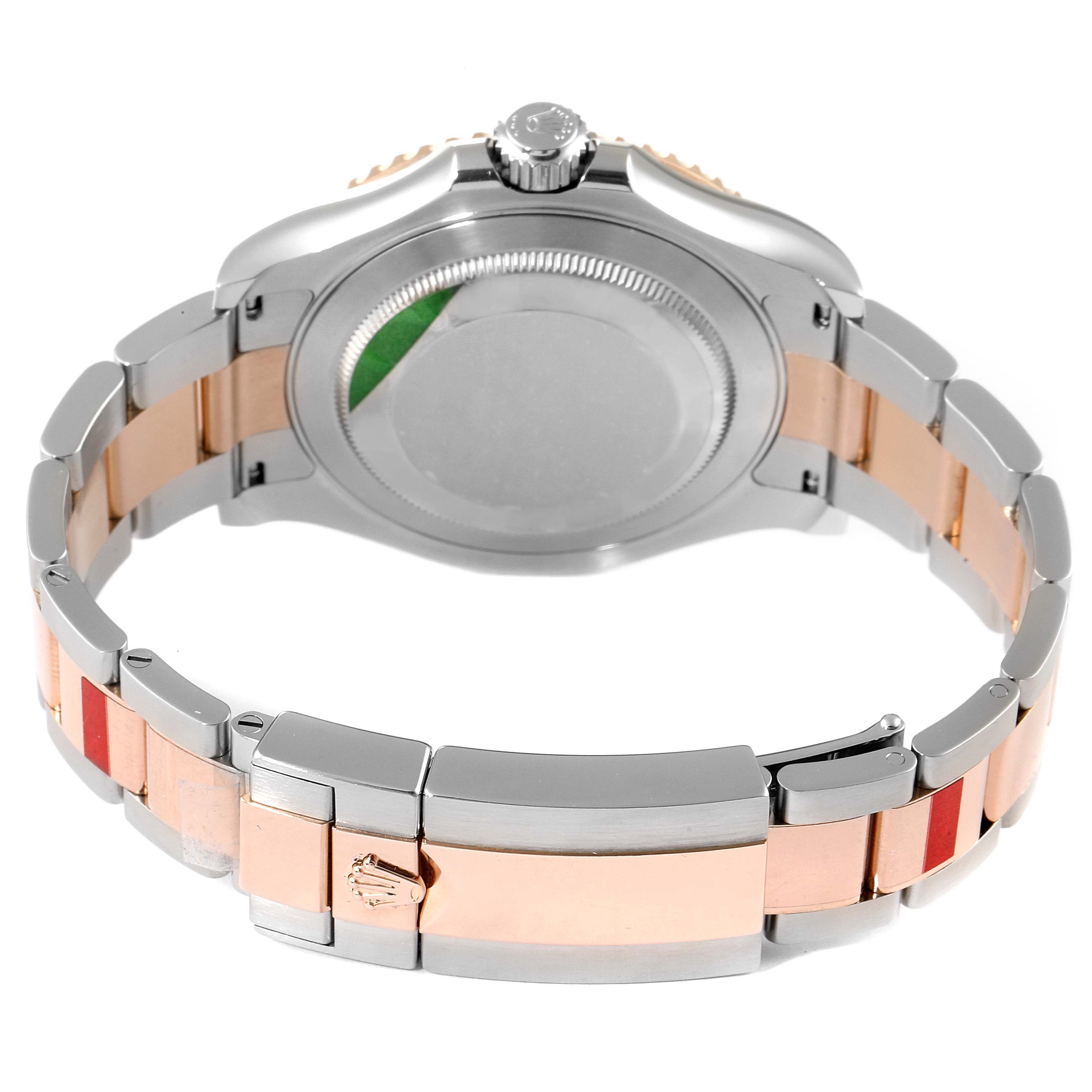 The image shows the back case and bracelet of the Rolex Yacht-Master 116621 Men
s Steel and Gold (two tone) Black Dial 116621 Men
s Steel and Gold (two tone) Black Dial watch, viewed from a rear angle.