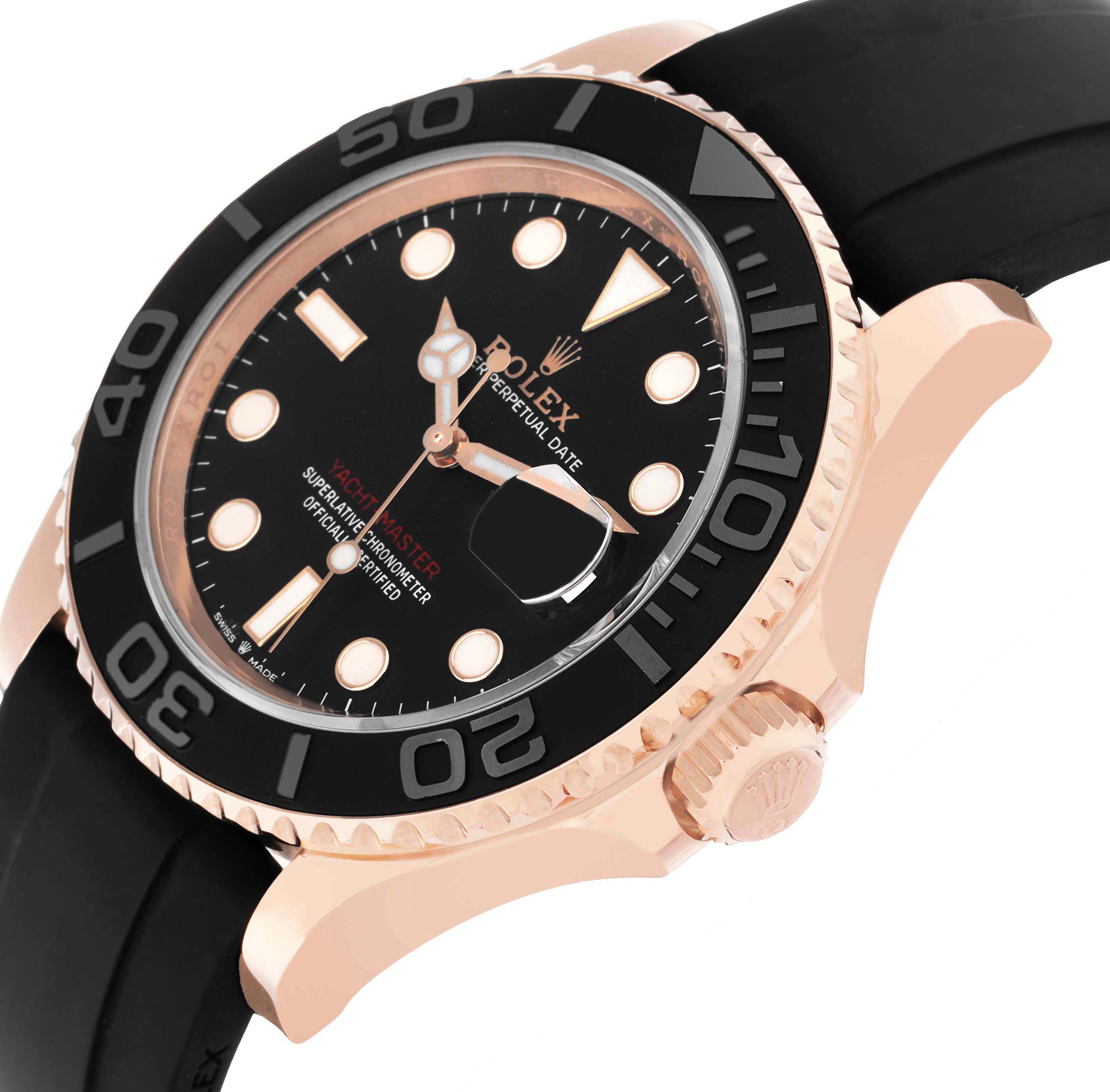 The Rolex Yacht-Master 126655 Men's Rose Gold Black Dial watch is shown at an angled side view, highlighting the black bezel, dial, and the crown.