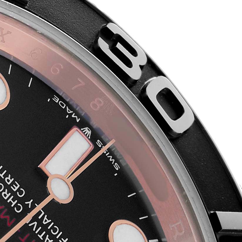 The image shows a close-up of the Rolex Yacht-Master 126655 Men's Rose Gold Black Dial watch's bezel and partial dial at an angle, highlighting the 30-minute mark.