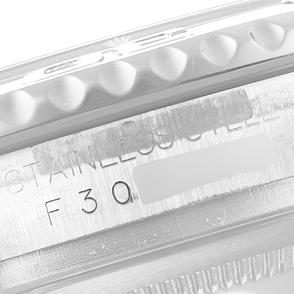 This image shows a close-up view of the bezel and case of a Rolex Yacht-Master 16622 Men's Stainless Steel Silver Dial 16622 Men's Stainless Steel Silver Dial watch, highlighting the serial or model number engraving.