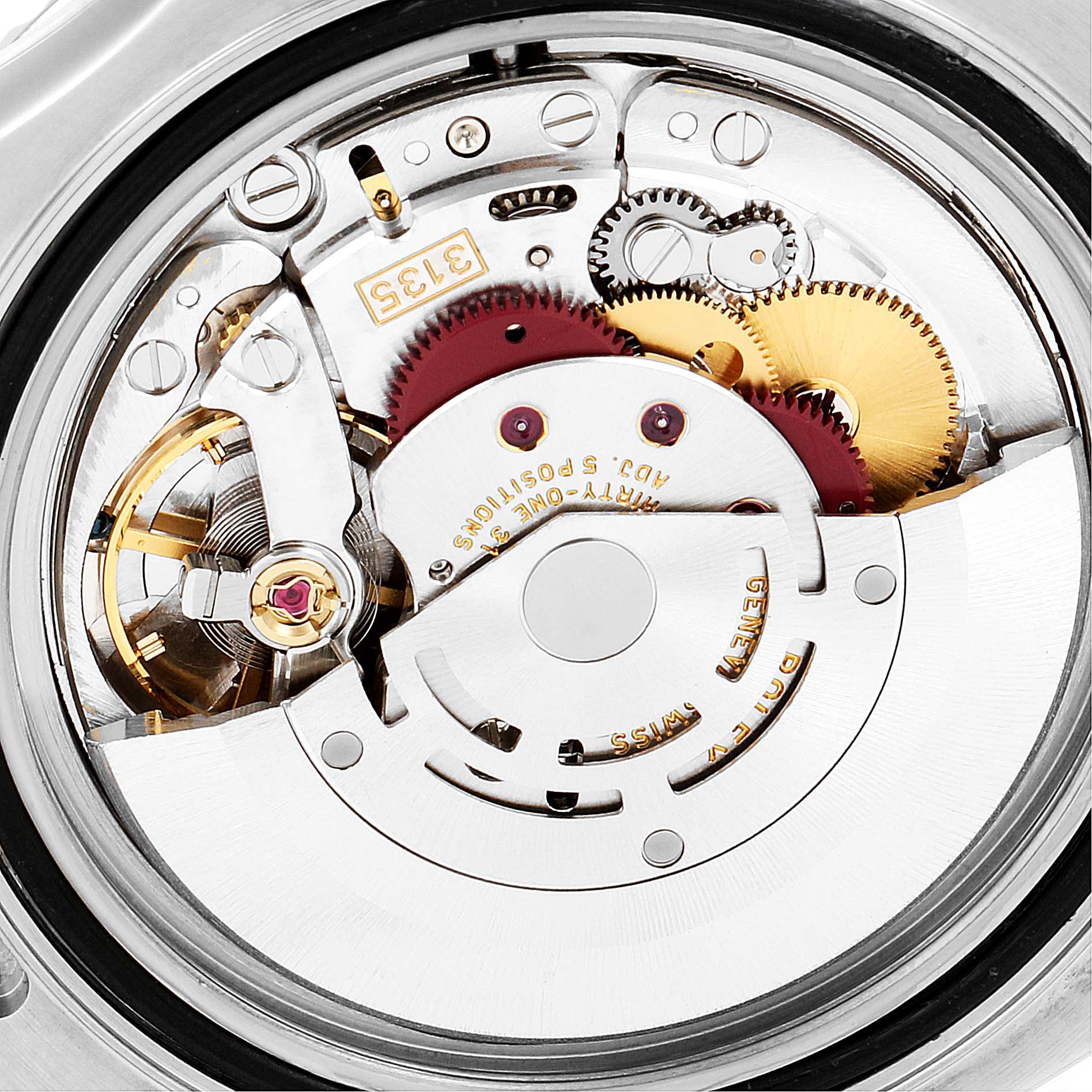 This image shows a close-up view of the internal mechanics of the Rolex Yacht-Master 16622 Men's Stainless Steel Silver Dial 16622 Men's Stainless Steel Silver Dial watch, focusing on the movement gears and components.