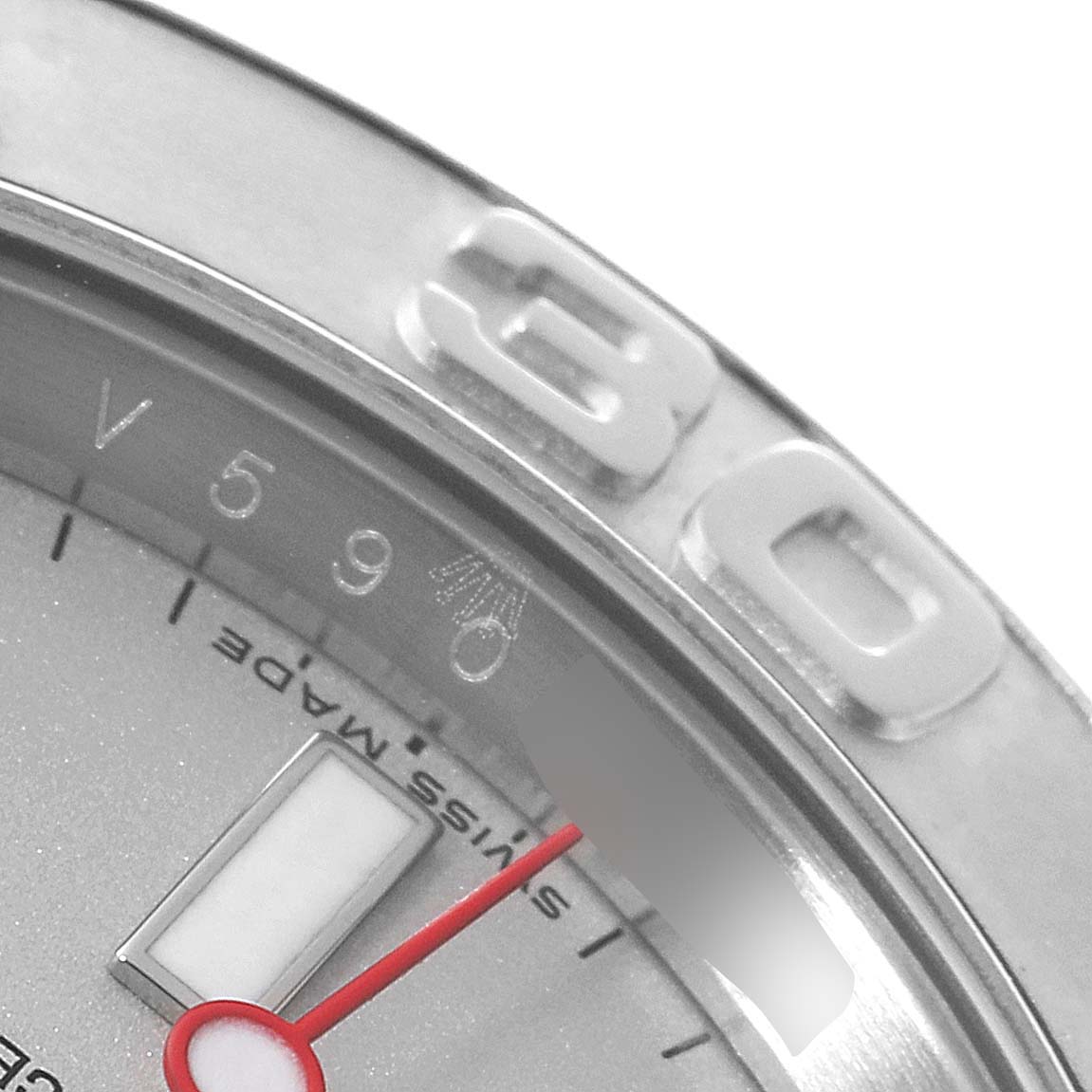 The image shows a close-up of the Rolex Yacht-Master 16622 Men's Stainless Steel Silver Dial 16622 Men's Stainless Steel Silver Dial watch face, focusing on the bezel and part of the dial with numbers and a red hand.