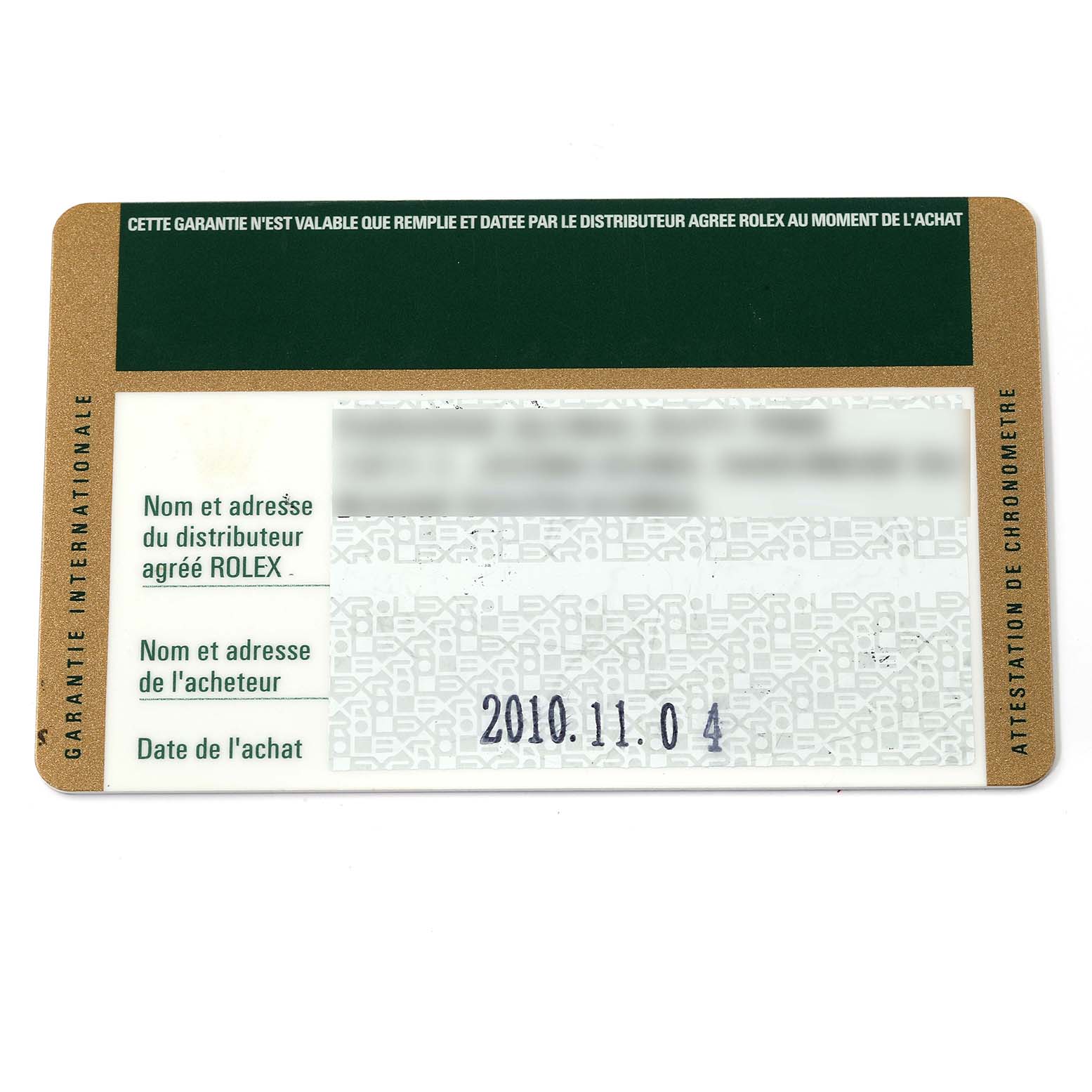 This is a close-up of the warranty certificate for the Rolex Yacht-Master 16622 Men's Stainless Steel Silver Dial 16622 Men's Stainless Steel Silver Dial watch.