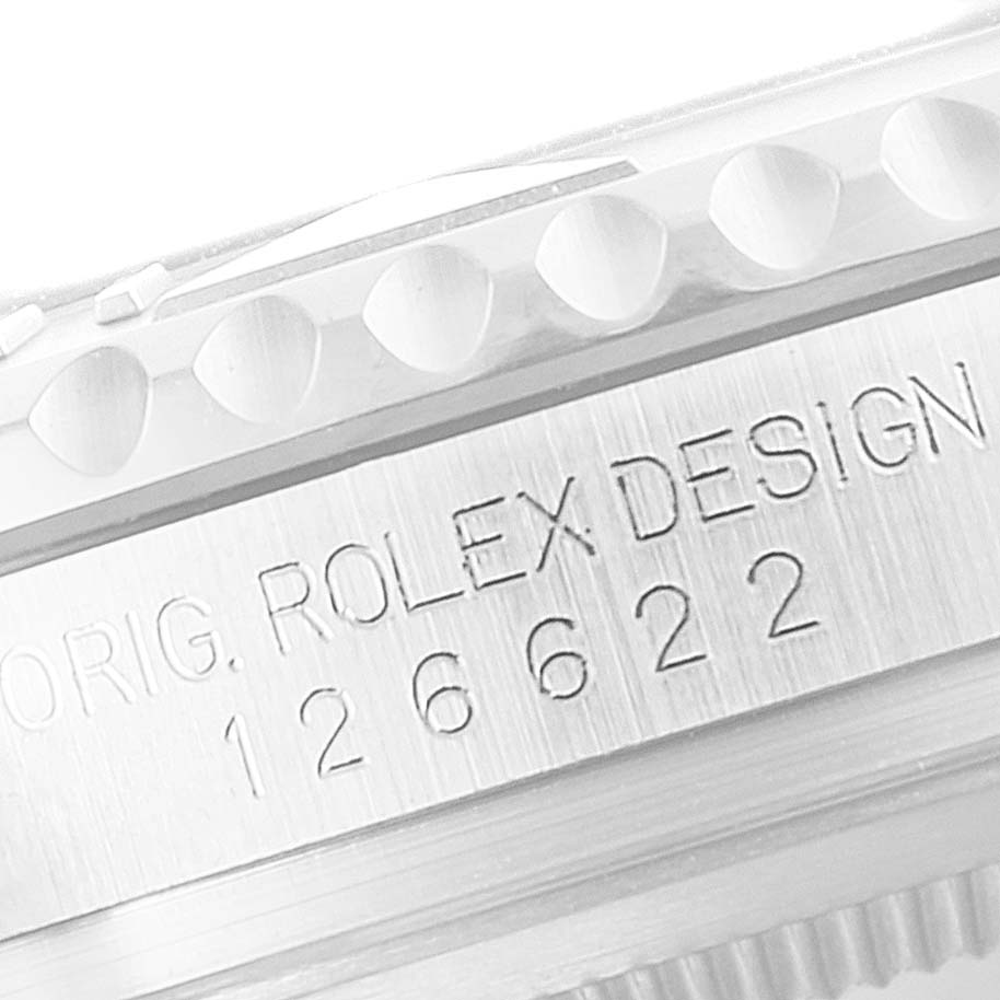 The image shows a close-up of the side of a Rolex Yacht-Master 126622 Men
s Stainless Steel Blue Dial 126622 Men
s Stainless Steel Blue Dial
s case with "ROLEX DESIGN 126622" engraved.
