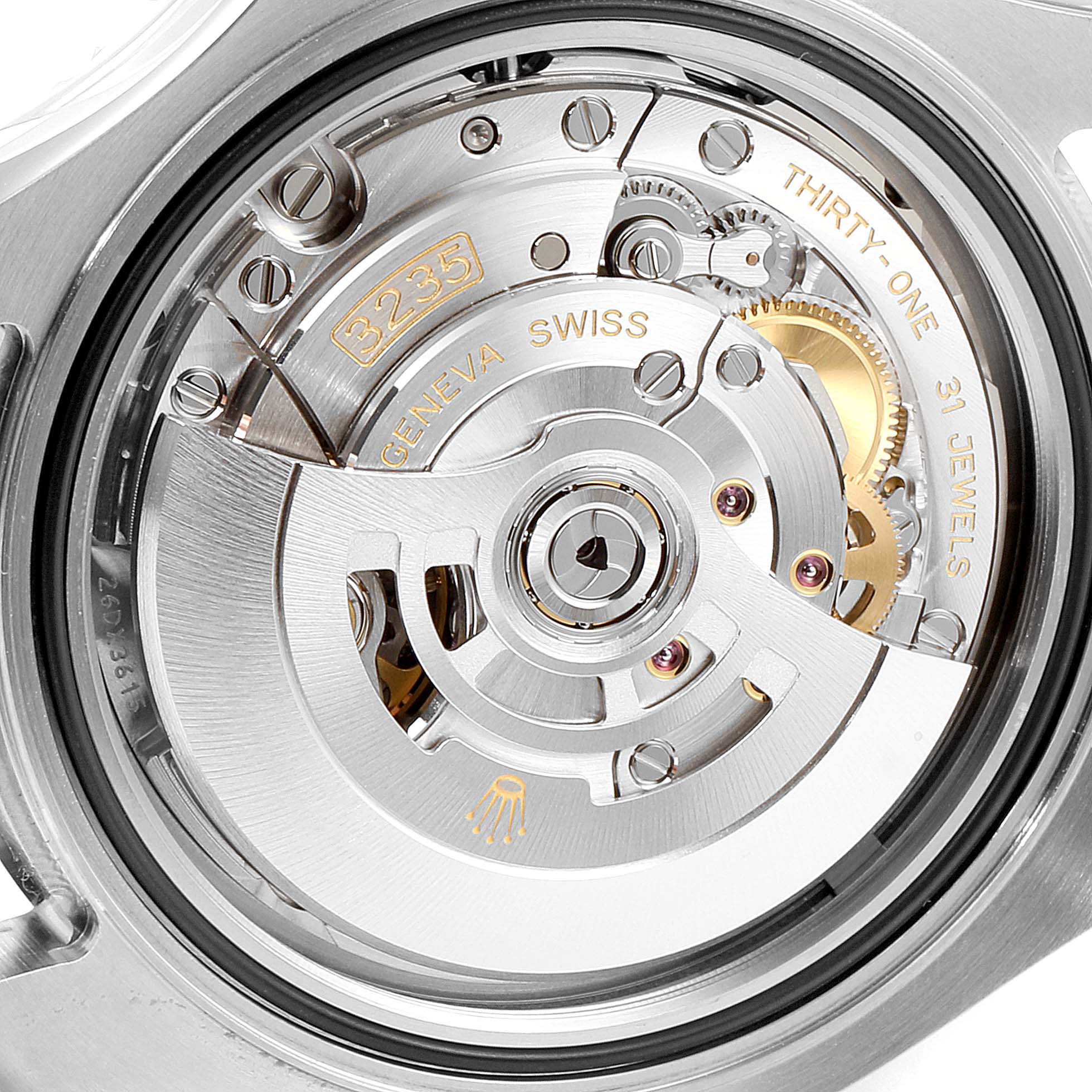 The image shows the movement mechanism of a Rolex Yacht-Master 126622 Men
s Stainless Steel Blue Dial 126622 Men
s Stainless Steel Blue Dial watch, displaying gears and text on the back.