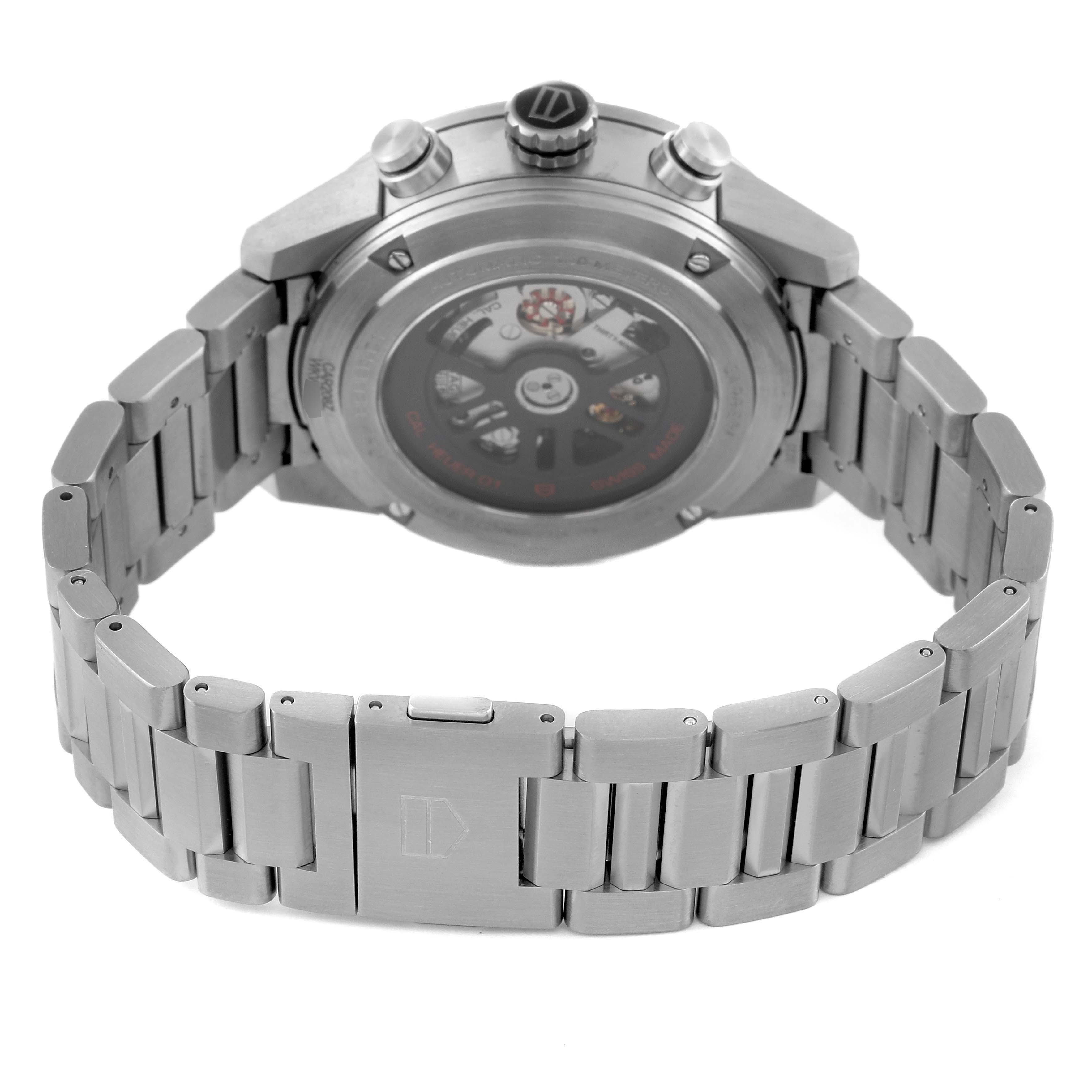 The image shows the back and clasp of a Tag Heuer Carrera CAR208Z.BF0719 Men's Titanium Grey Dial CAR208Z.BF0719 Men's Titanium Grey Dial watch, highlighting its metal bracelet and exposed case back.