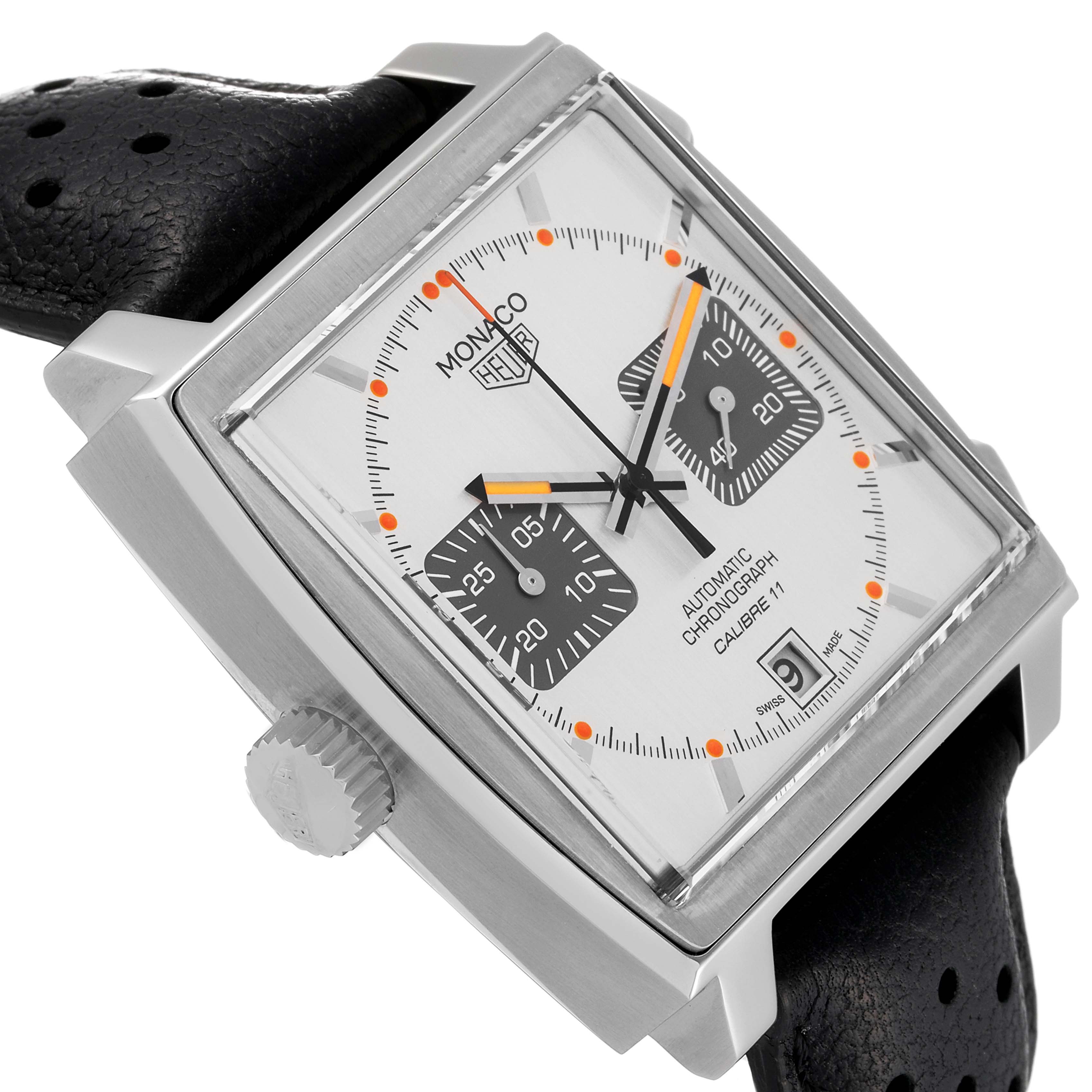 The image shows a close-up angled view of the Tag Heuer Monaco watch, highlighting the dial, crown, and part of the strap.