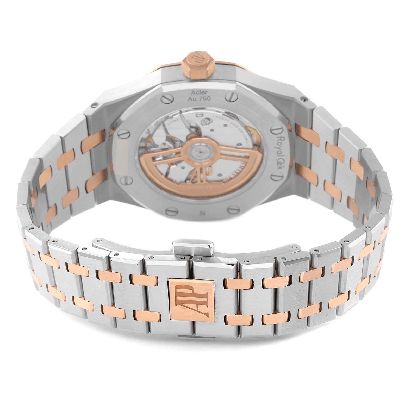 The image shows the back and bracelet of the Royal Oak model by Audemars Piguet, highlighting its open caseback and two-tone bracelet.