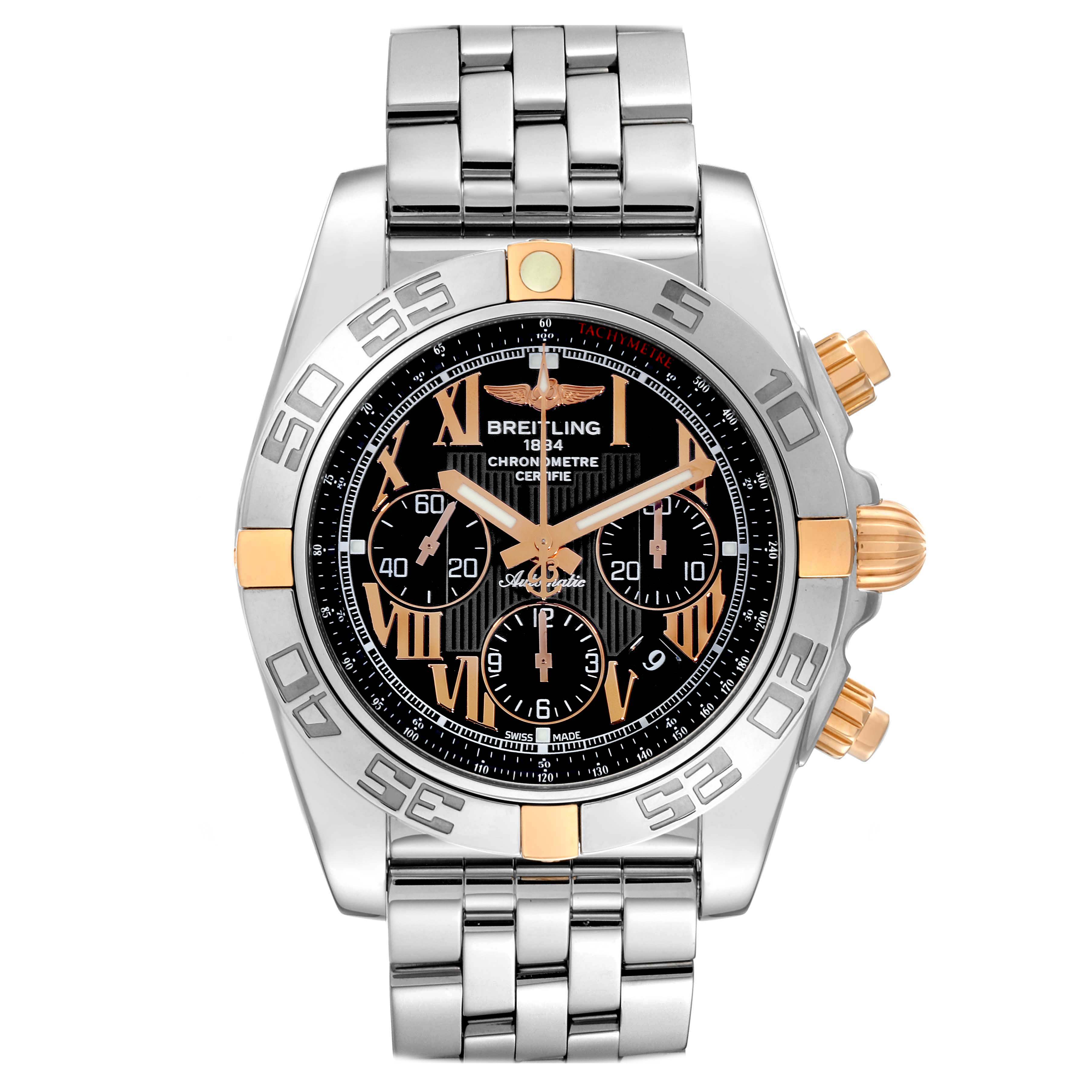 The Breitling Chronomat IB0110 Men's Steel and Gold (two tone) Black Dial IB0110 Men's Steel and Gold (two tone) Black Dial watch is shown from a front angle, displaying the dial, bezel, and part of the bracelet.