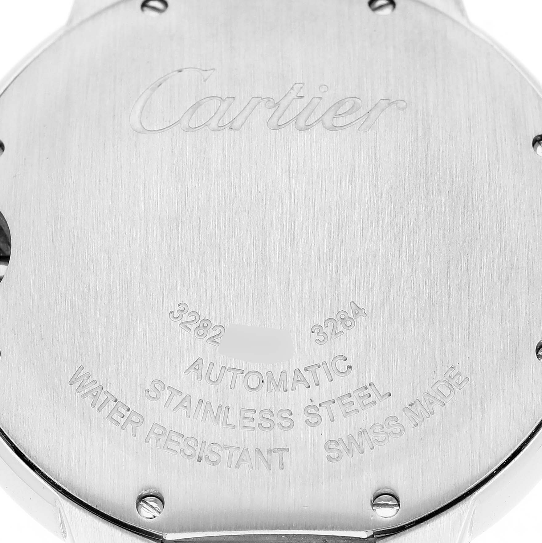 The image shows the engraved back case of a Cartier Ballon Bleu W2BB0012 Men's Steel and Gold (two tone) Silver Dial W2BB0012 Men's Steel and Gold (two tone) Silver Dial watch, highlighting details like "Automatic," "Stainless Steel," and "Water Resistant."