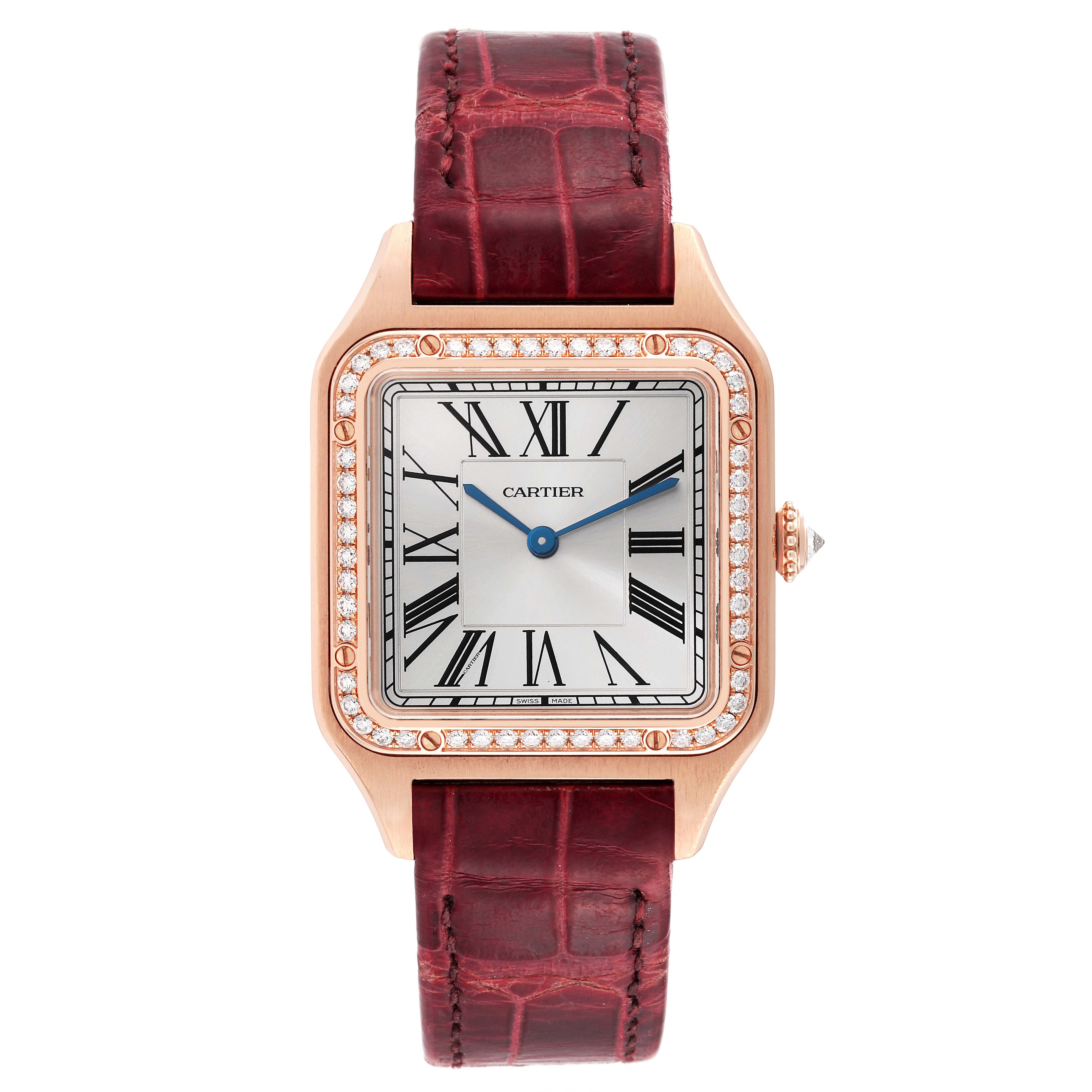 The Cartier Santos WJSA0016 Women's Rose Gold Silver Dial WJSA0016 Women's Rose Gold Silver Dial watch is shown from the front, displaying its square face, Roman numerals, blue hands, bezel, and leather strap.