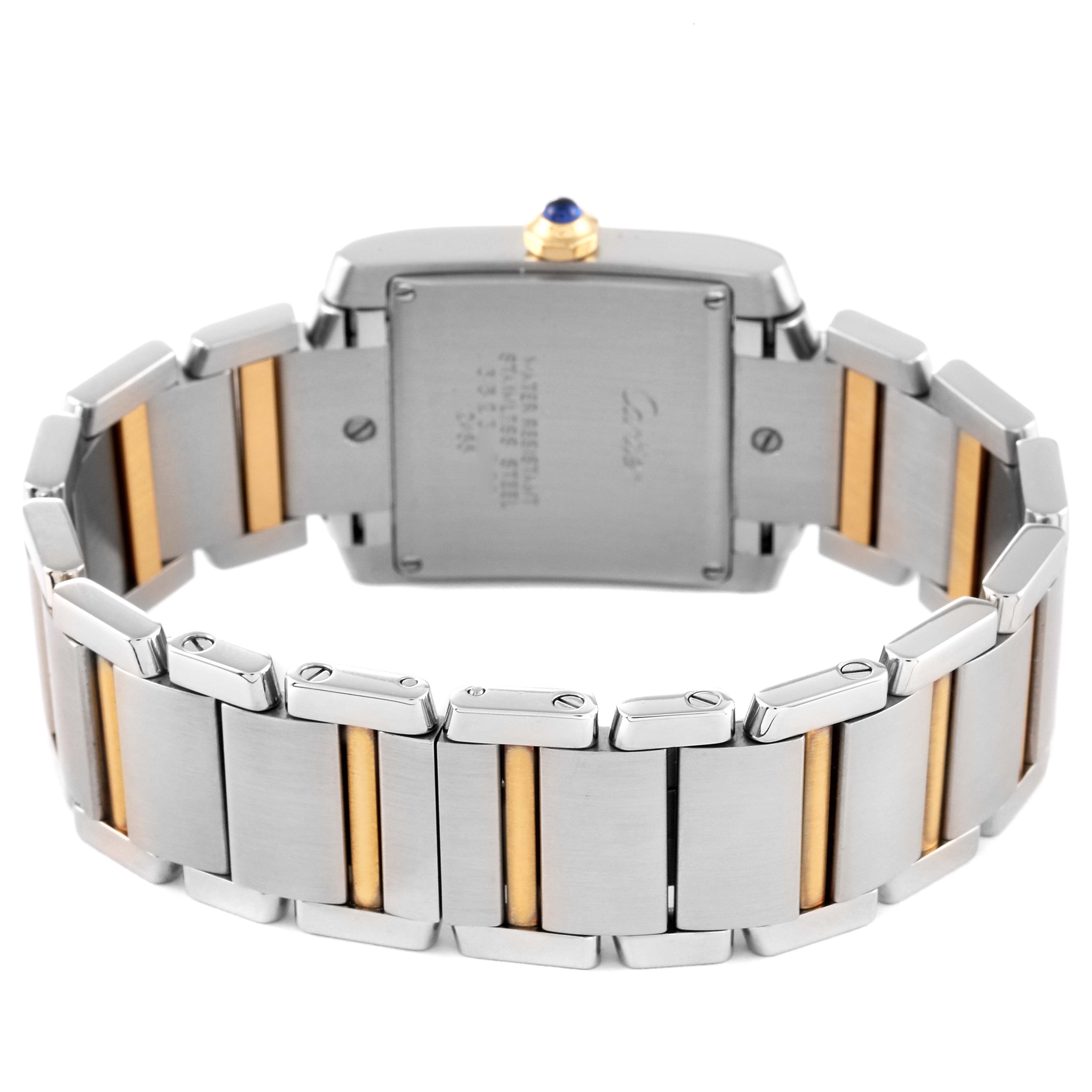 The image shows the back case and bracelet of a Cartier Tank Francaise W51012Q4 Women's Steel and Gold (two tone) Silver Dial W51012Q4 Women's Steel and Gold (two tone) Silver Dial watch, highlighting the two-tone metal design.
