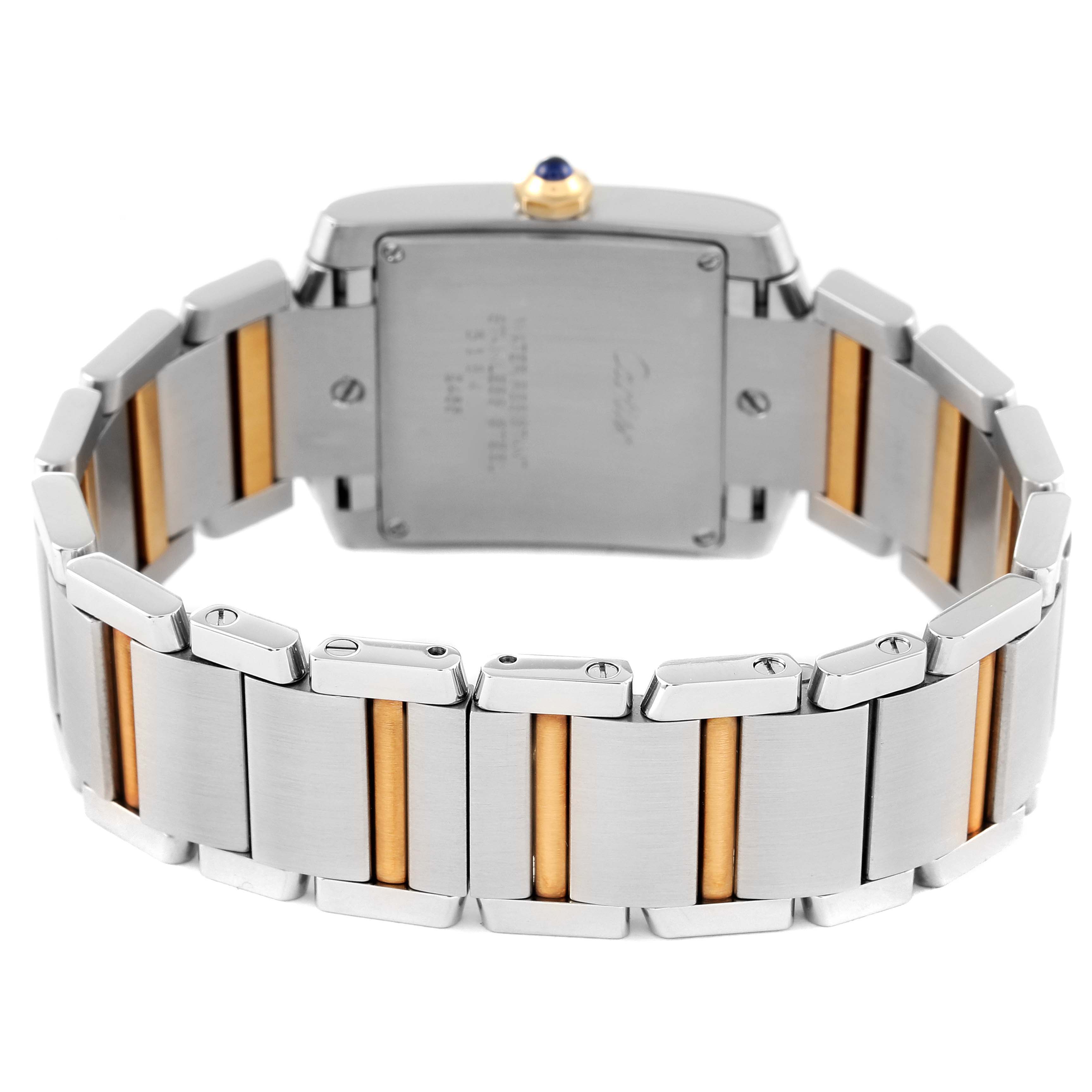 The image shows the back view of a Tank Francaise watch by Cartier, highlighting the two-toned bracelet and the case back.