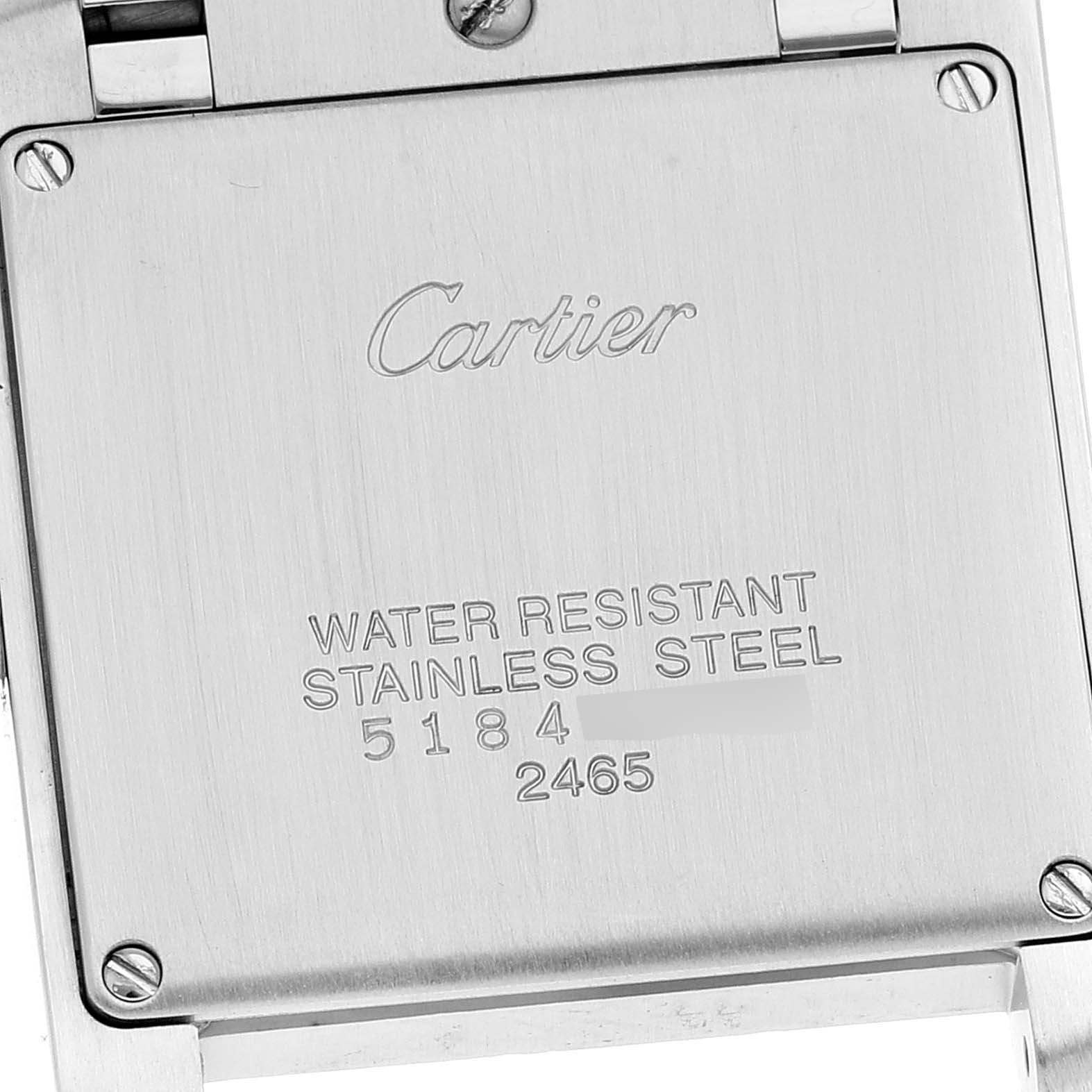 The image shows the back of a Cartier Tank Francaise W51012Q4 Women's Steel and Gold (two tone) Silver Dial W51012Q4 Women's Steel and Gold (two tone) Silver Dial watch, highlighting the water resistance, material, and model/serial numbers.