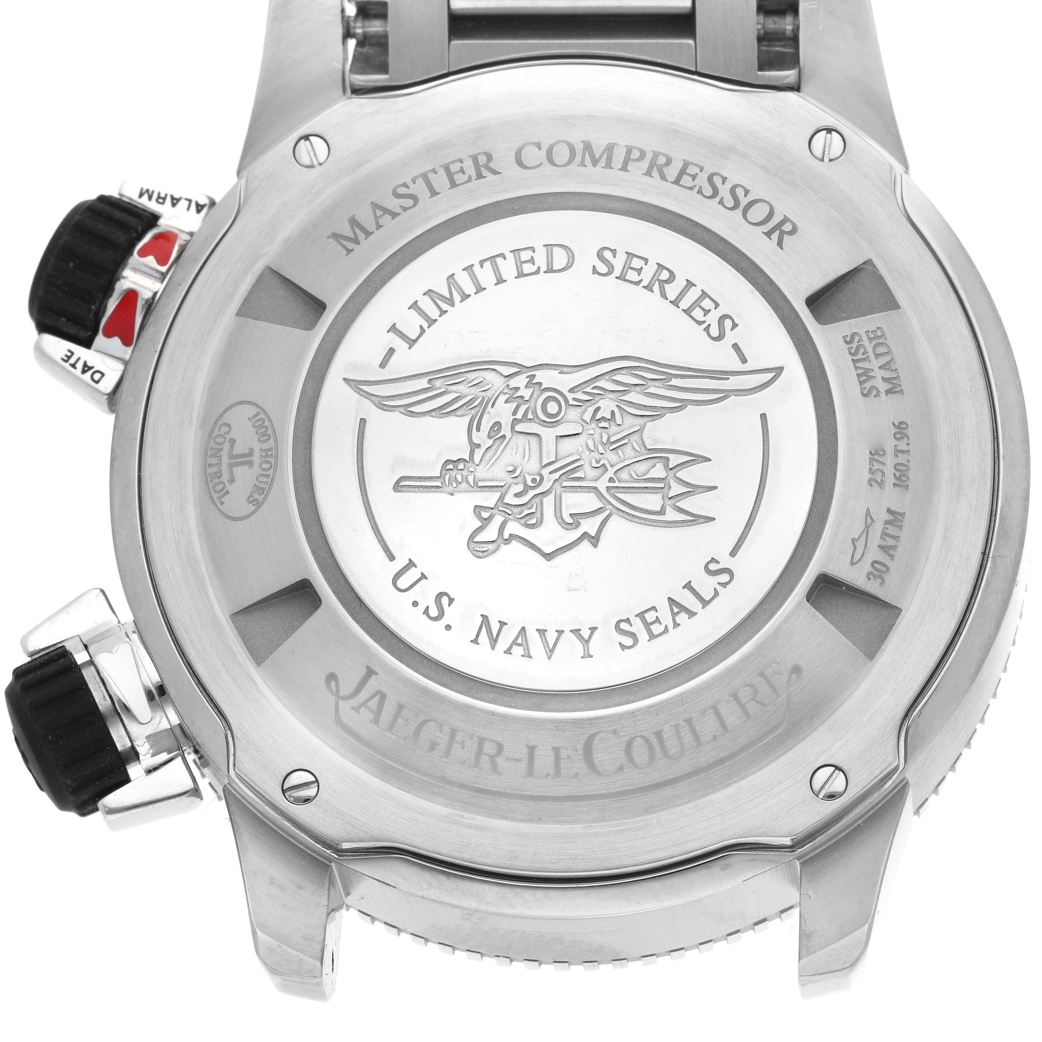 The image shows the back casing of the Jaeger-LeCoultre Master Compressor watch, including engraved details and crown controls.