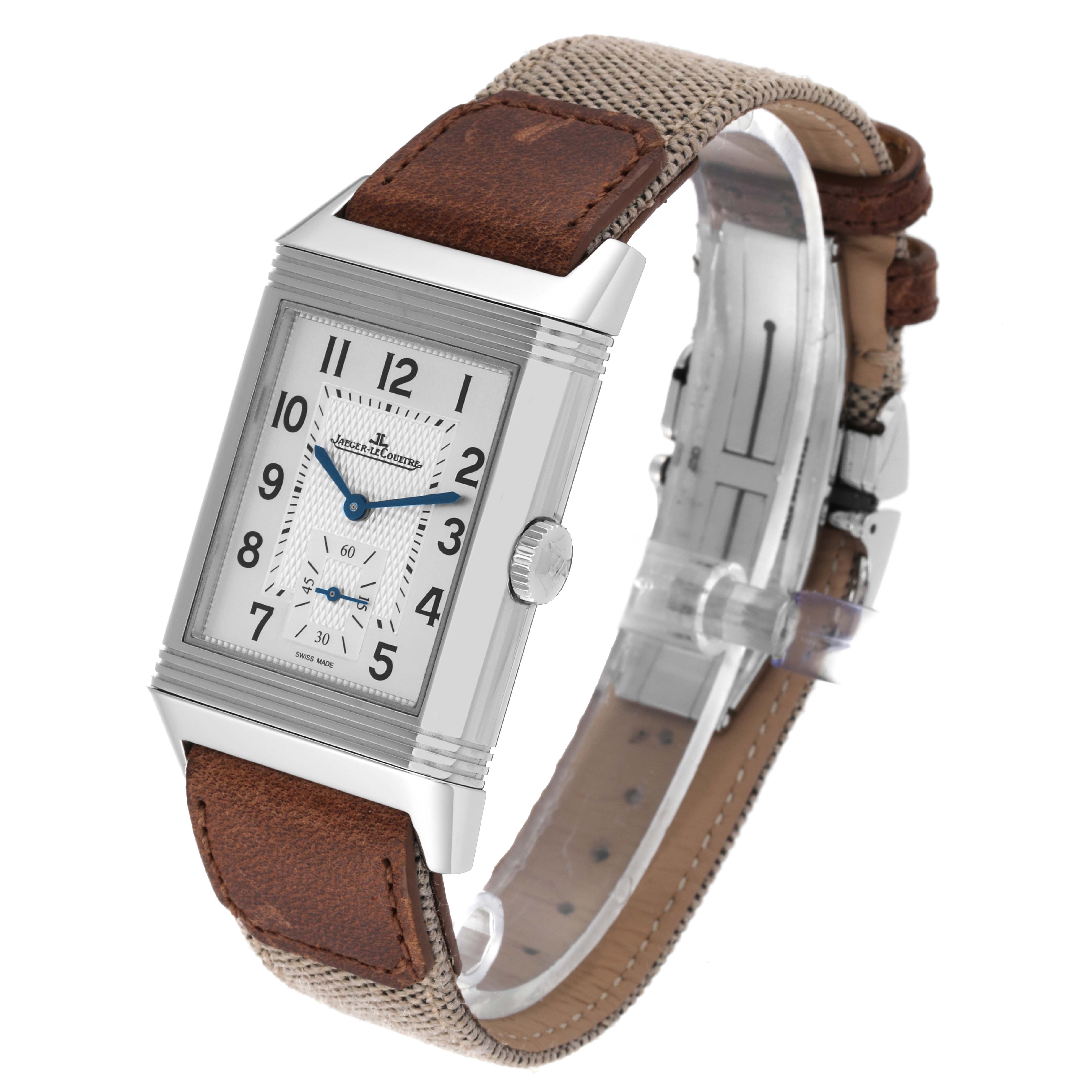 The image shows a Jaeger-LeCoultre Reverso watch at a three-quarter angle featuring the face, dial, case, crown, and leather band.