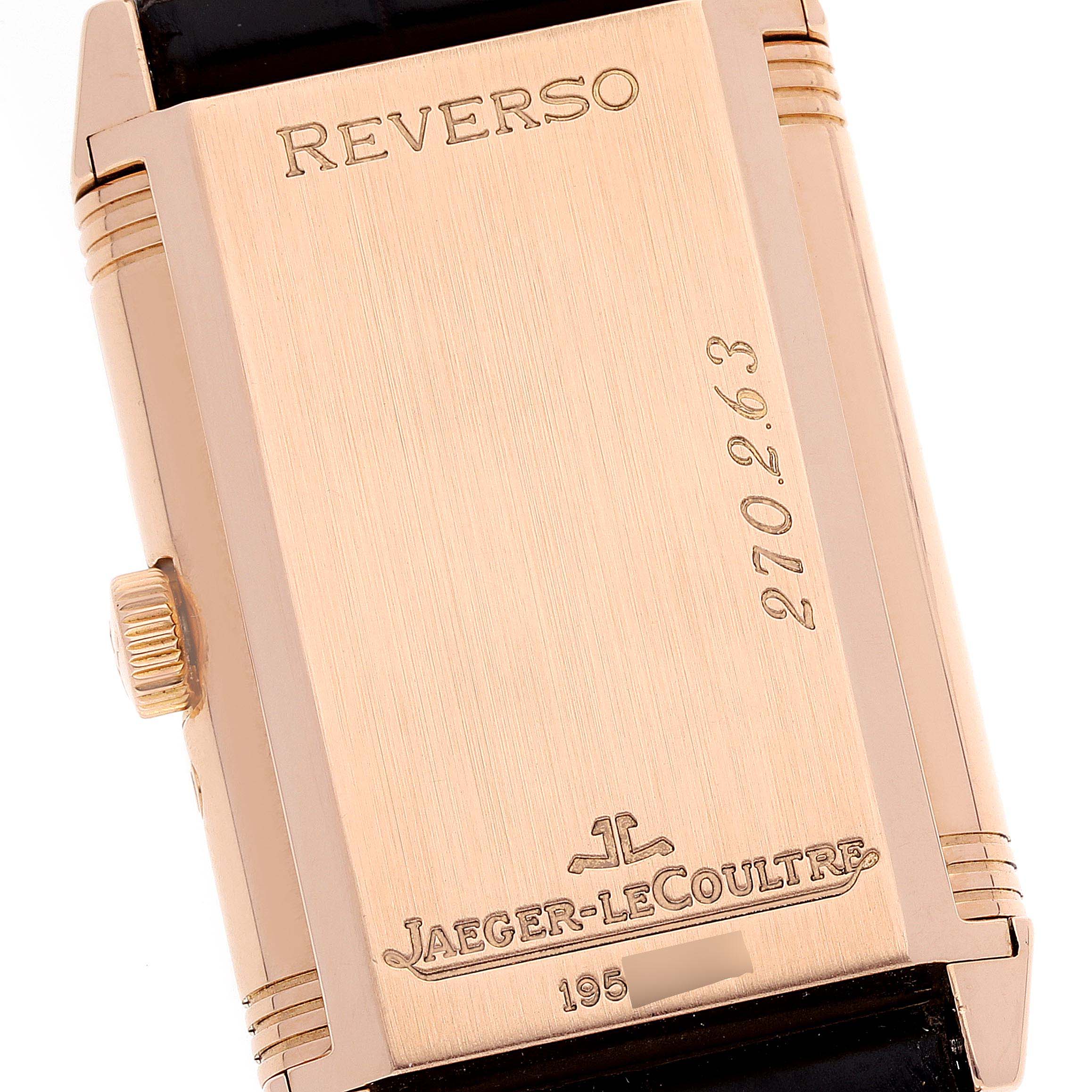 This image shows the back case and crown of the Jaeger-LeCoultre Reverso watch.