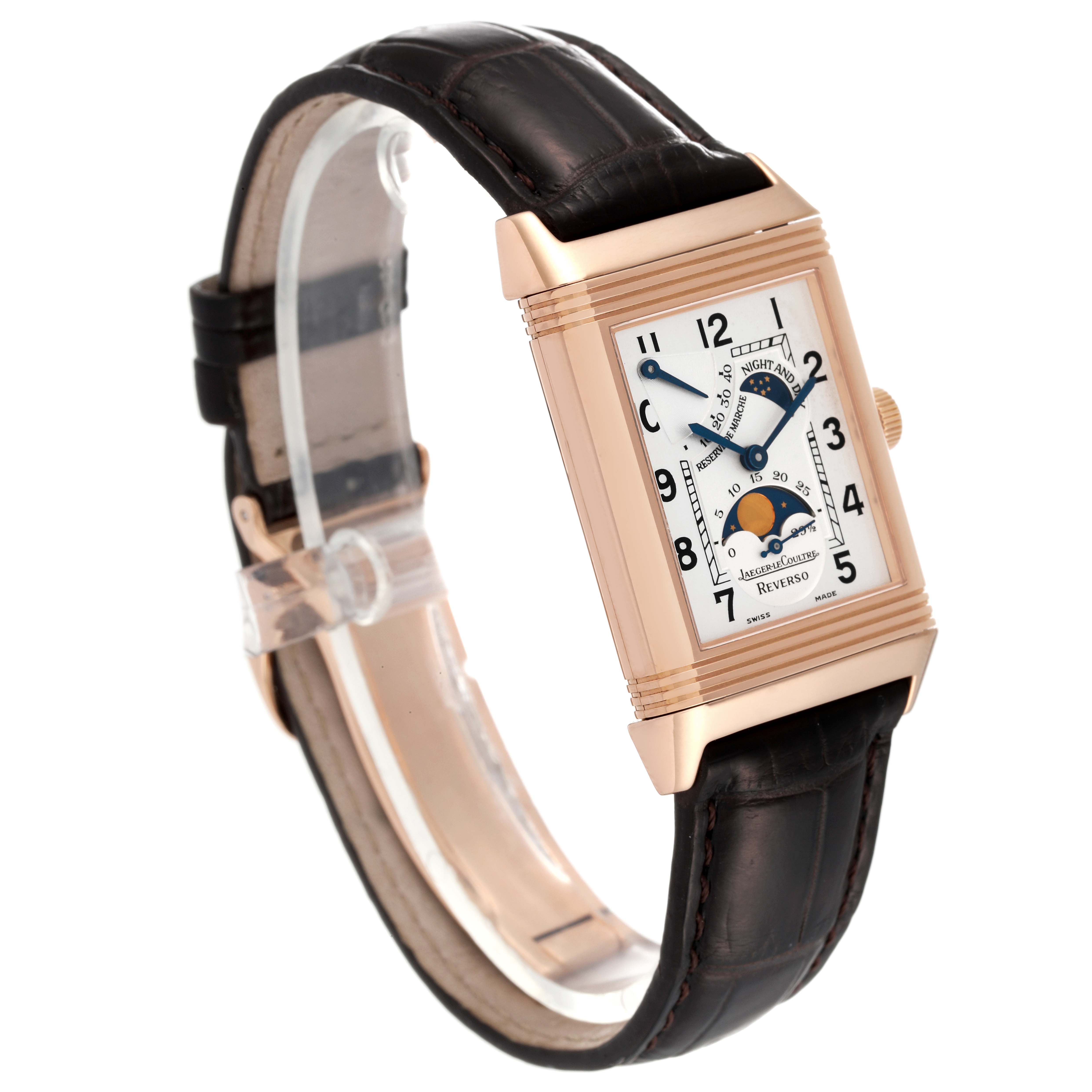 The Jaeger LeCoultre Reverso Q2752420 Men
s Rose Gold Silver Dial Q2752420 Men
s Rose Gold Silver Dial watch is shown at an angle highlighting the front face and part of the leather strap.