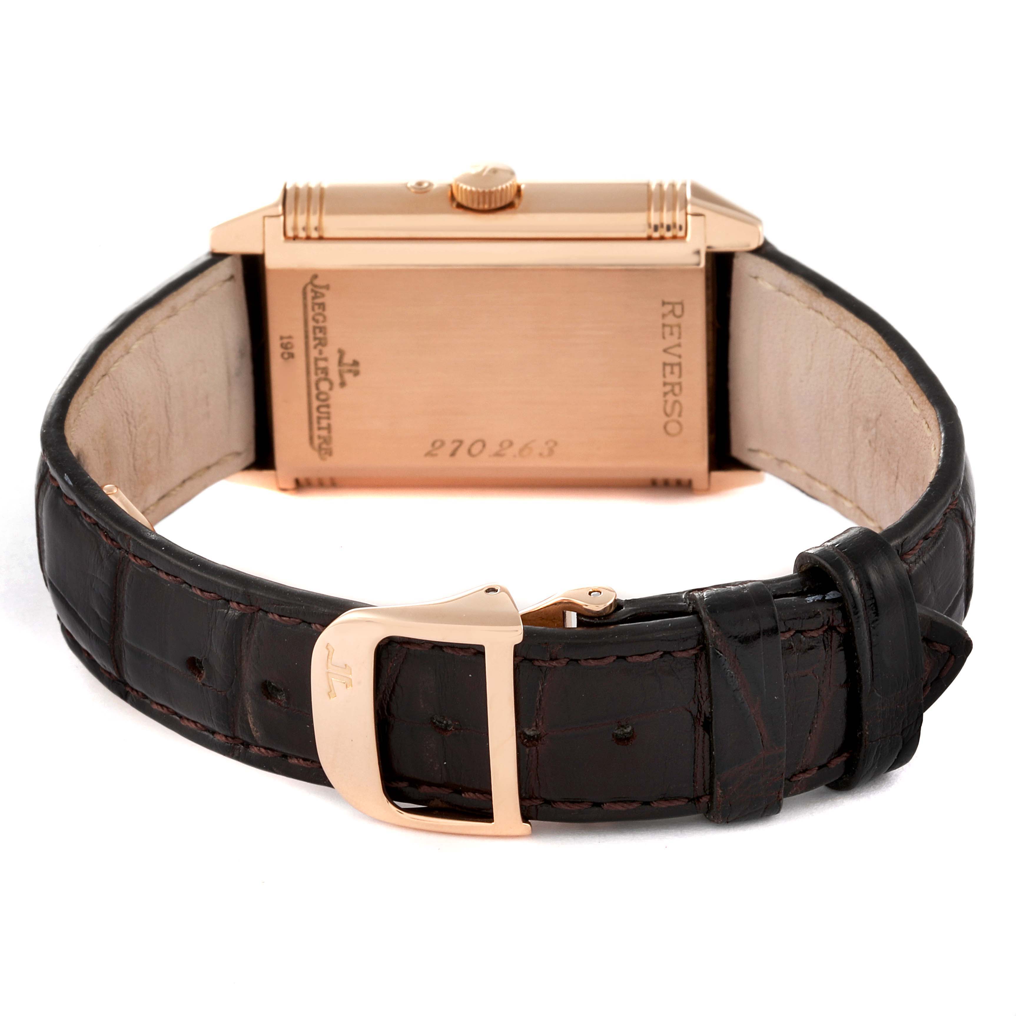 This image shows the back and side of the Jaeger LeCoultre Reverso Q2752420 Men
s Rose Gold Silver Dial Q2752420 Men
s Rose Gold Silver Dial watch, featuring a rose gold case and a black leather strap.