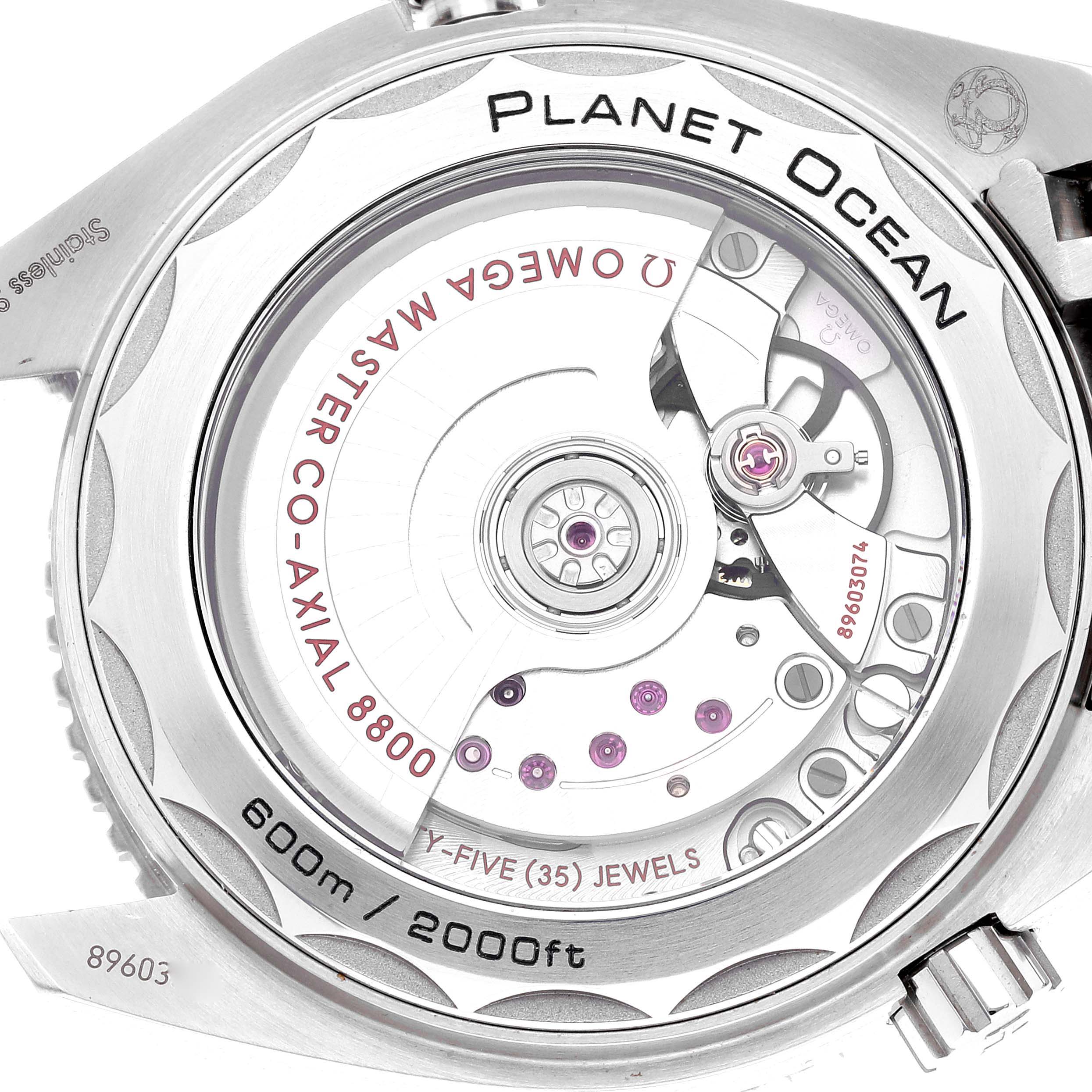 The image shows the back of the Omega Planet Ocean 215.30.40.20.01.001 Men's Stainless Steel Black Dial 215.30.40.20.01.001 Men's Stainless Steel Black Dial watch, highlighting the Master Co-Axial 8800 movement and the depth rating.