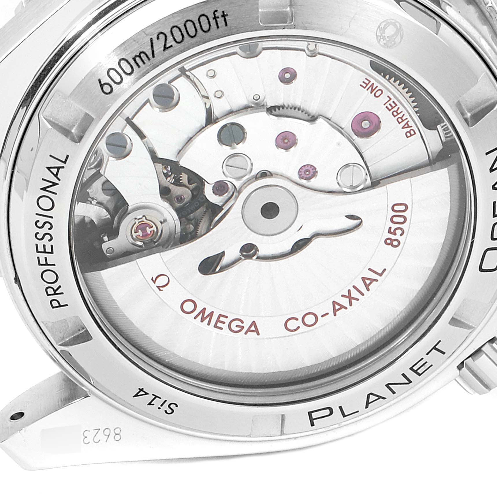 The image shows the back view of the Omega Planet Ocean 232.30.42.21.01.002 Men's Stainless Steel Black Dial 232.30.42.21.01.002 Men's Stainless Steel Black Dial watch, revealing its internal mechanical movements and engravings.