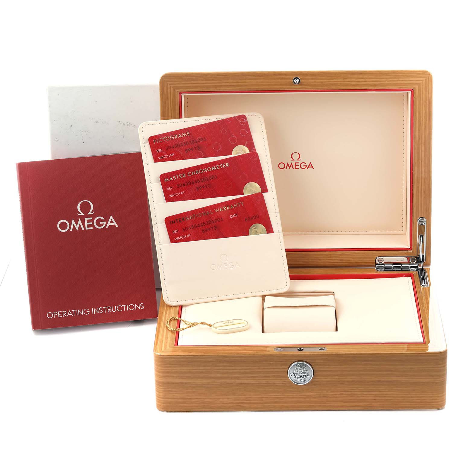 The image shows the packaging and accessories of an Omega Seamaster 304.30.44.52.01.001 Men's Stainless Steel Black Dial 304.30.44.52.01.001 Men's Stainless Steel Black Dial, including the box, cards, and manual.