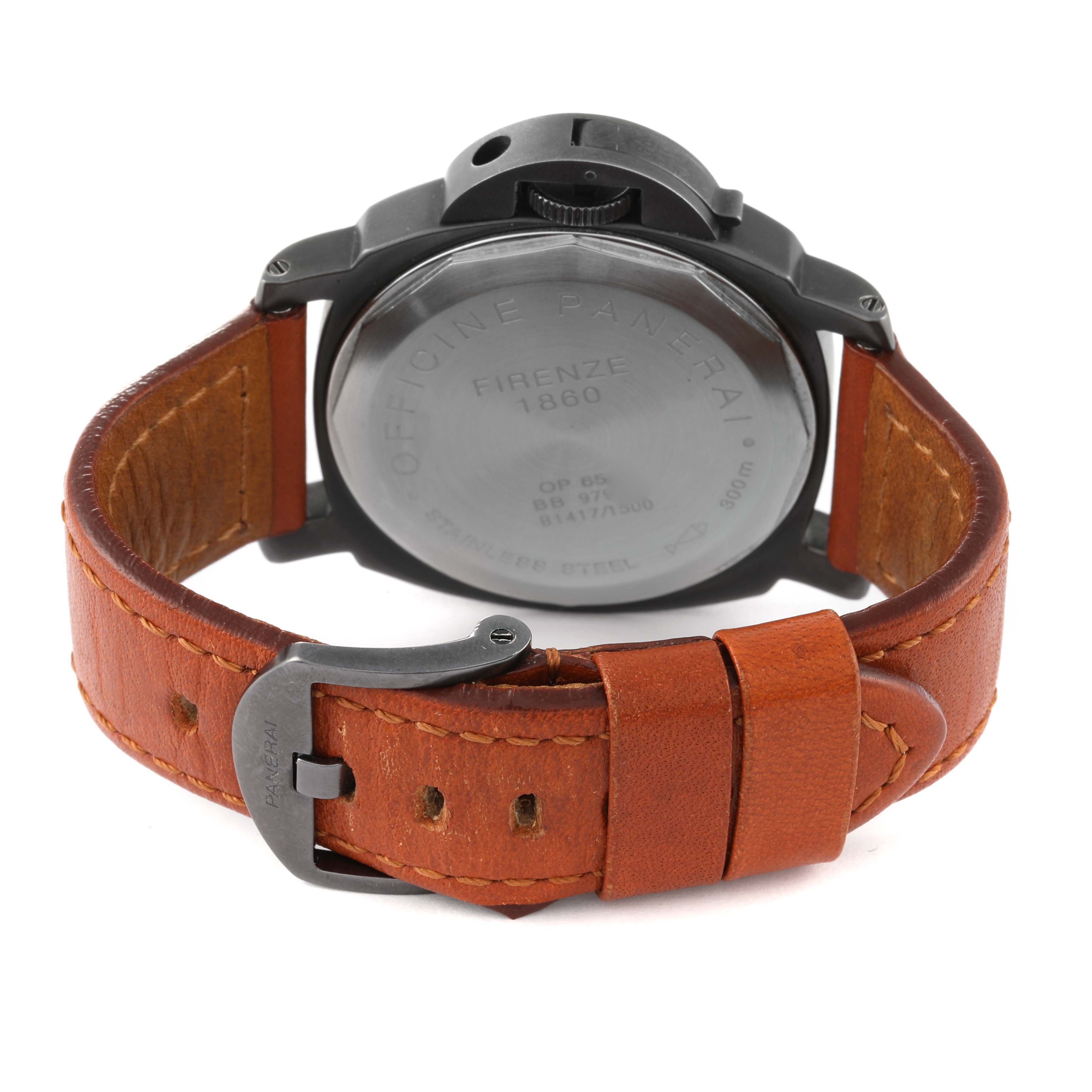 This image shows the back view of a Panerai Luminor PAM00009 Men
s Stainless Steel Black Dial PAM00009 Men
s Stainless Steel Black Dial watch, highlighting its engraved case back and leather strap with a buckle.