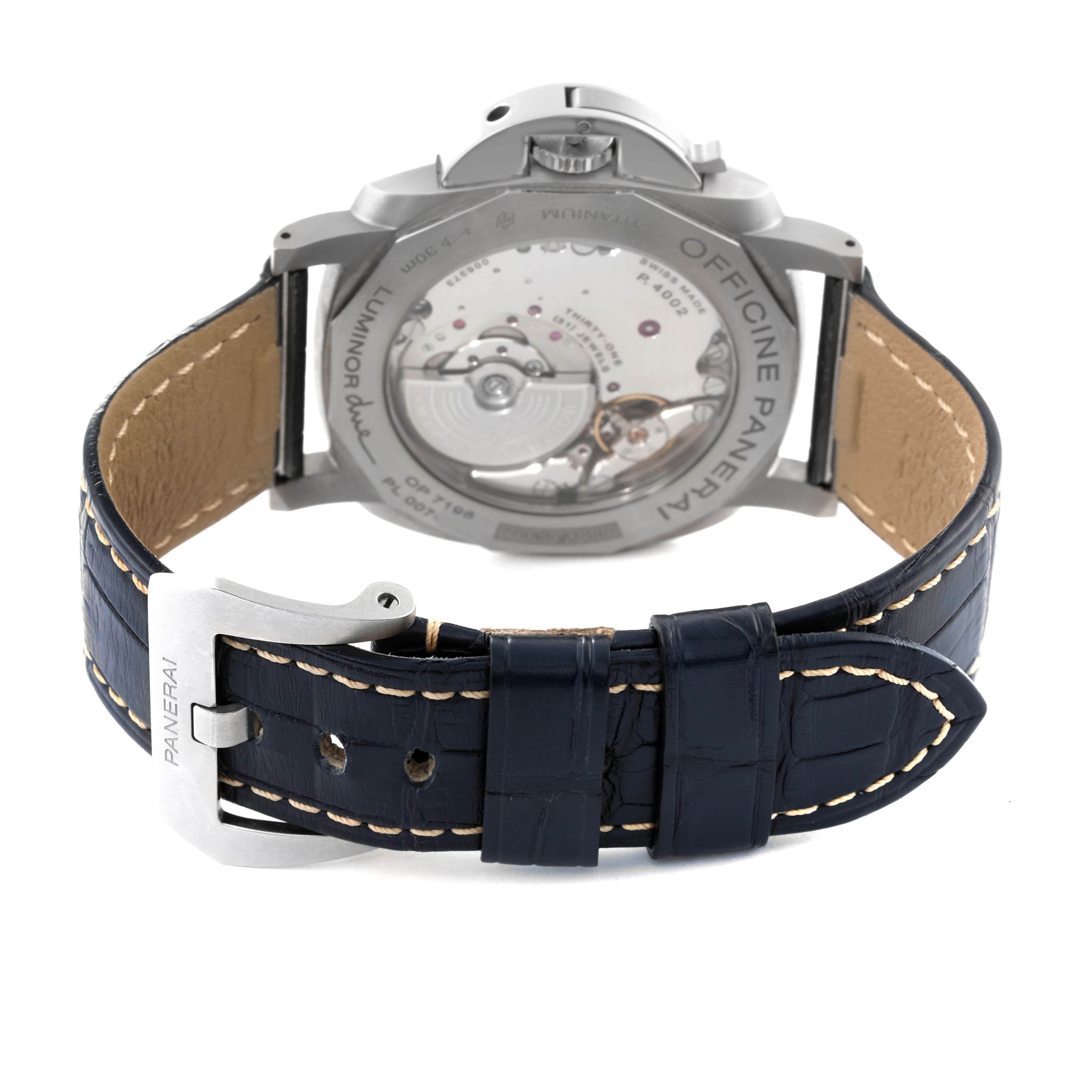 The image shows the back view of a Panerai Luminor Due PAM00964 Men
s Titanium Blue Dial PAM00964 Men
s Titanium Blue Dial watch, highlighting its transparent case back and dark leather strap with a buckle.
