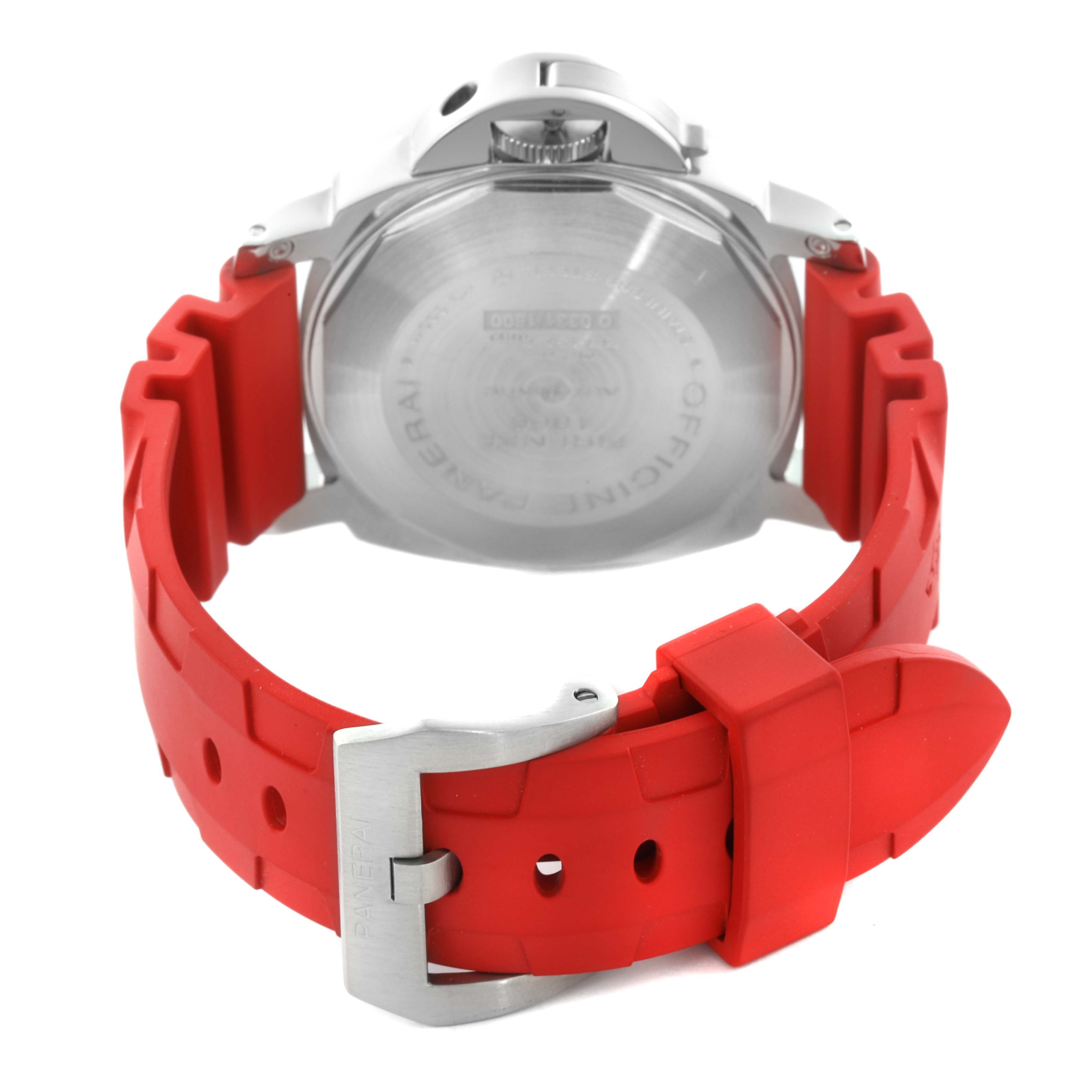 The Panerai Luminor PAM00088 Men's Stainless Steel Black Dial PAM00088 Men's Stainless Steel Black Dial watch is shown from the back, highlighting its case back and red strap.