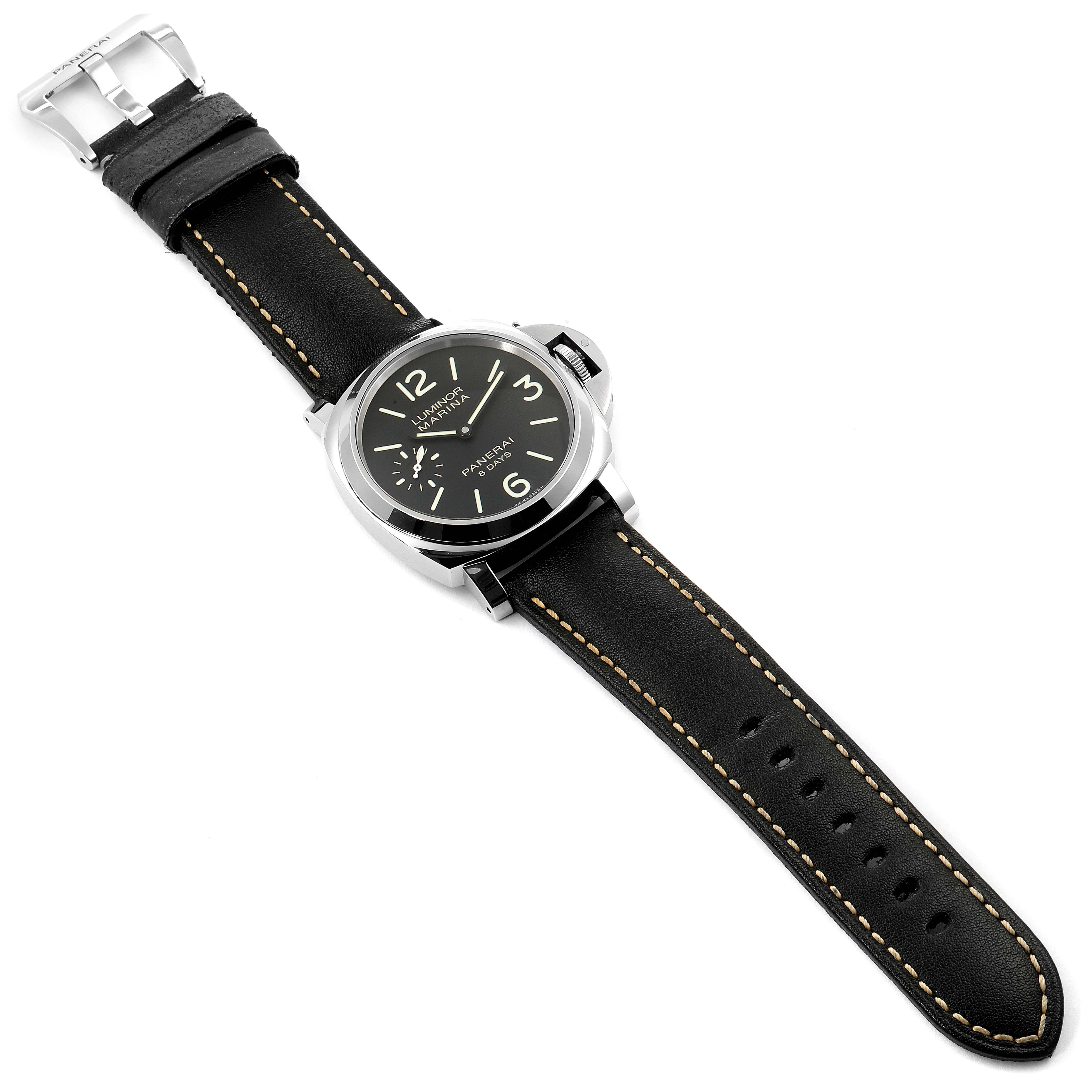 The image shows a Panerai Luminor 30562 Men
s Stainless Steel Black Dial 30562 Men
s Stainless Steel Black Dial watch from a top-down angle, displaying its face, case, and black leather strap.