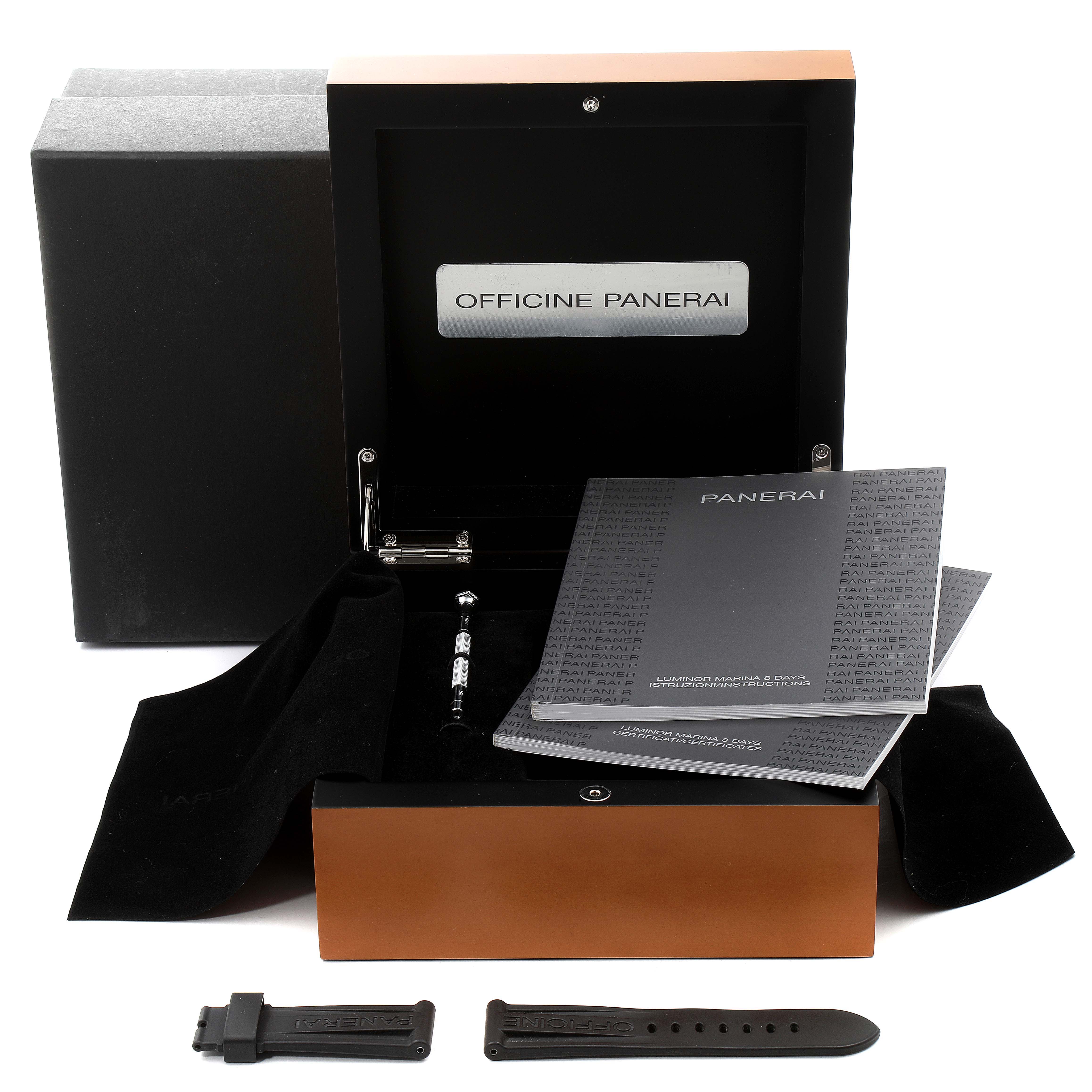 The image shows a top-down view of the box contents for a Panerai Luminor 30562 Men
s Stainless Steel Black Dial 30562 Men
s Stainless Steel Black Dial watch, including a strap, tool, and manuals.