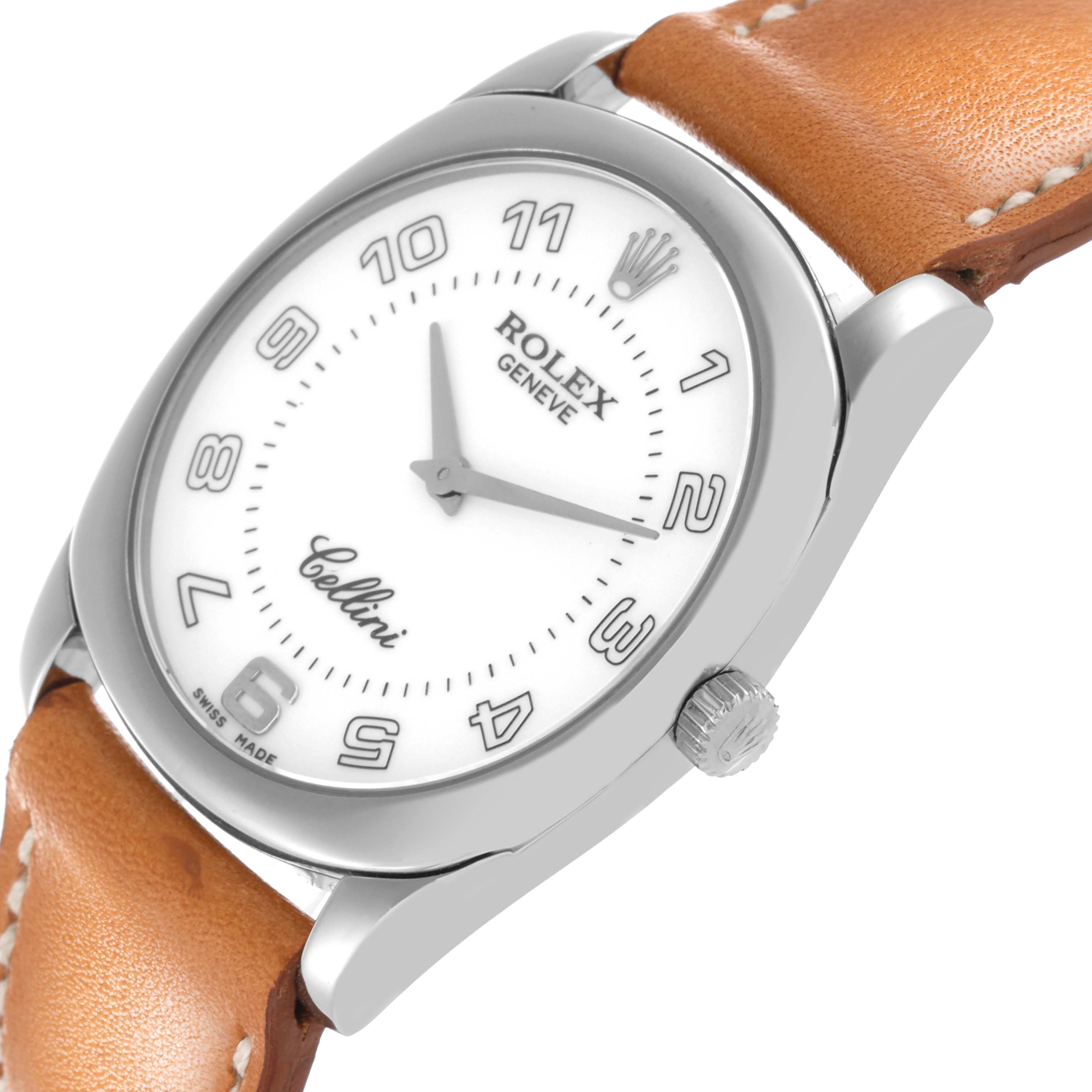 The Rolex Cellini 4233 Men's White Gold White Dial 4233 Men's White Gold White Dial watch is shown from a slight angle, displaying its face, crown, and leather strap.