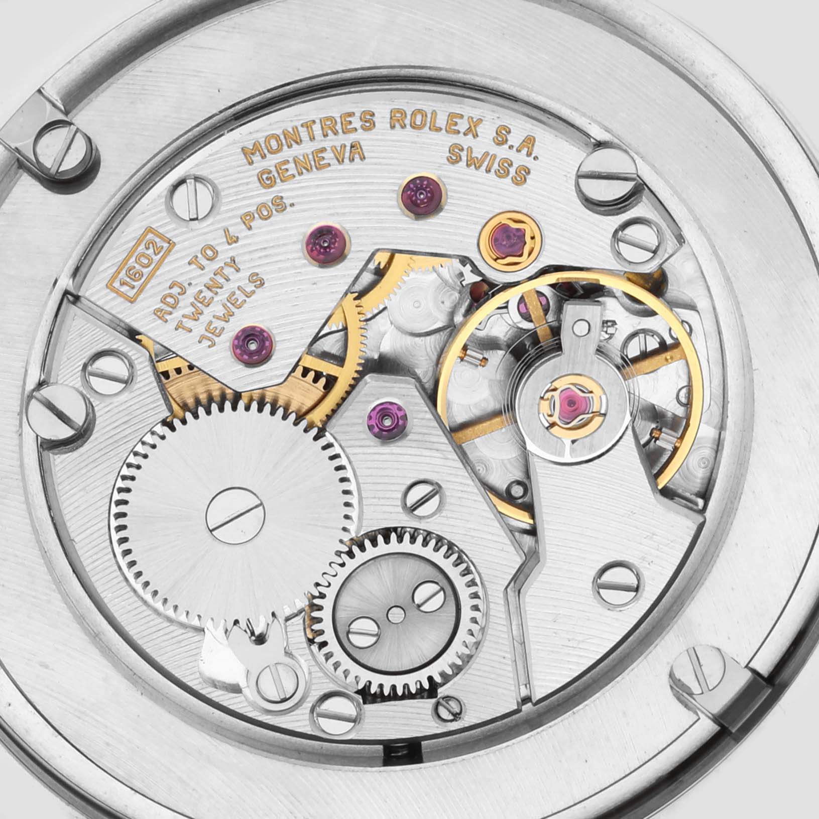 The image shows the intricate movement mechanism of a Rolex Cellini 4233 Men's White Gold White Dial 4233 Men's White Gold White Dial watch from a top-down angle.