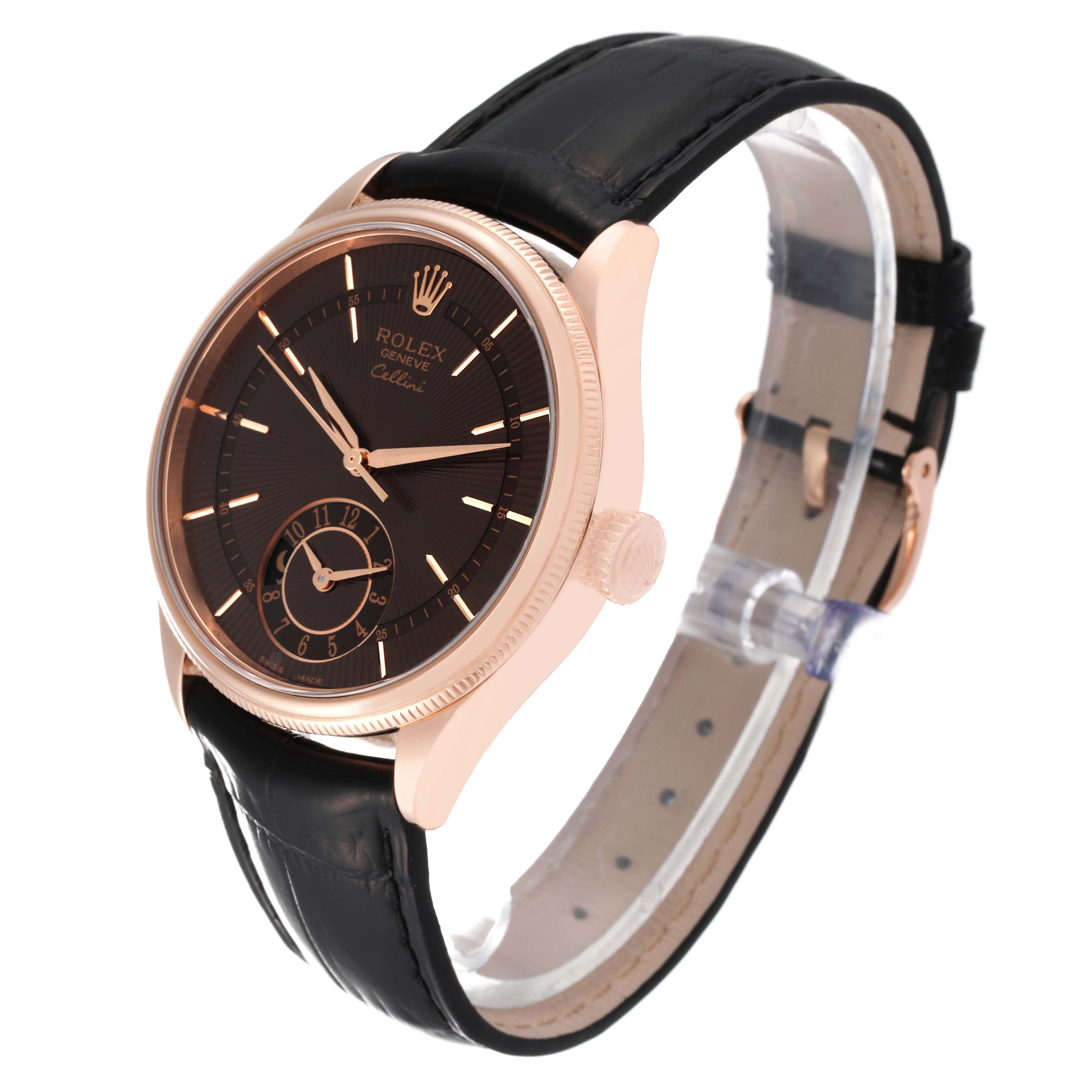 The image shows a Rolex Cellini 50525 Men's Rose Gold Brown Dial 50525 Men's Rose Gold Brown Dial watch at a three-quarter angle highlighting its black dial, rose gold case, and black leather strap.