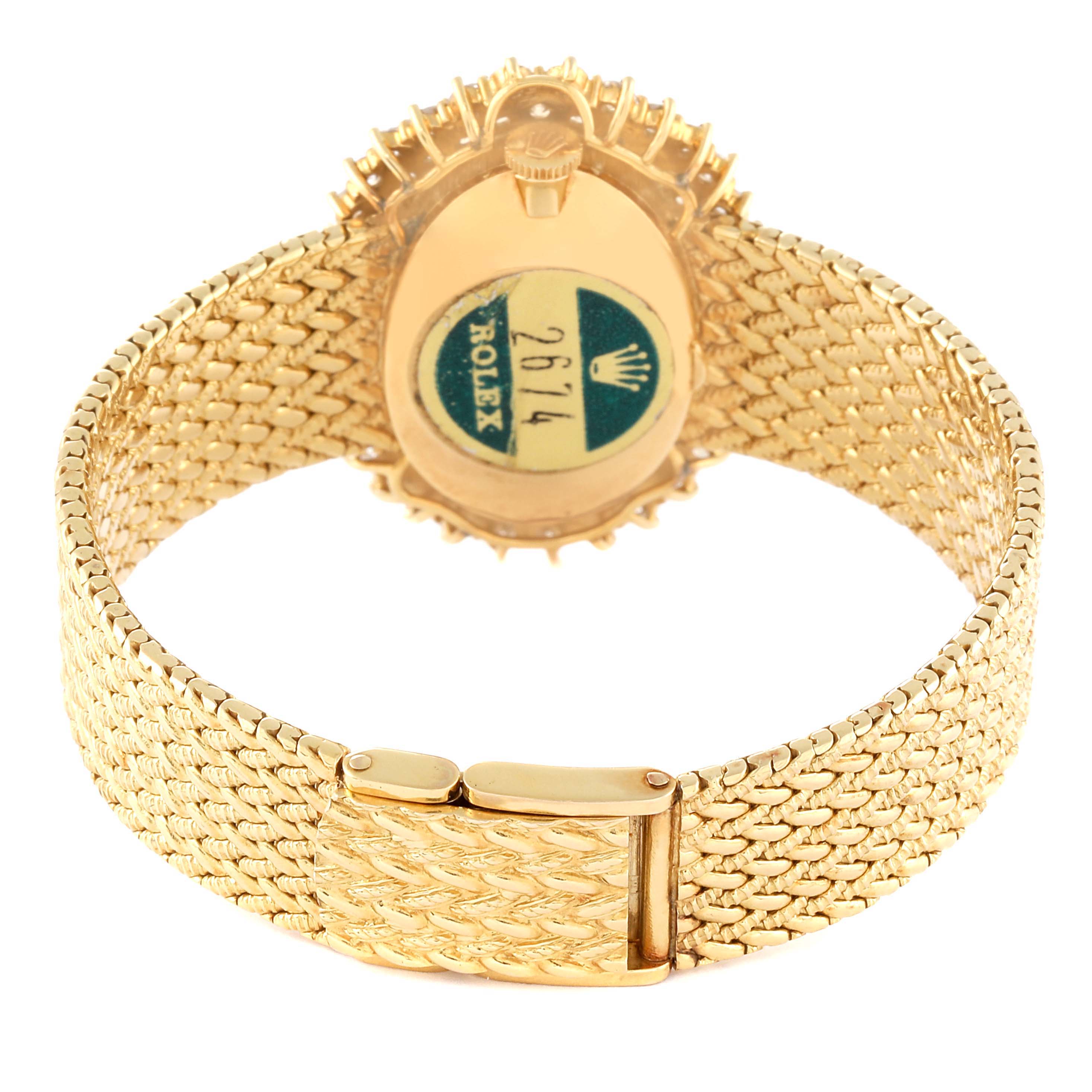 This image shows the back of a Rolex Cellini 2674 Women's Yellow Gold Champagne Dial 2674 Women's Yellow Gold Champagne Dial watch, focusing on the case and gold woven bracelet.