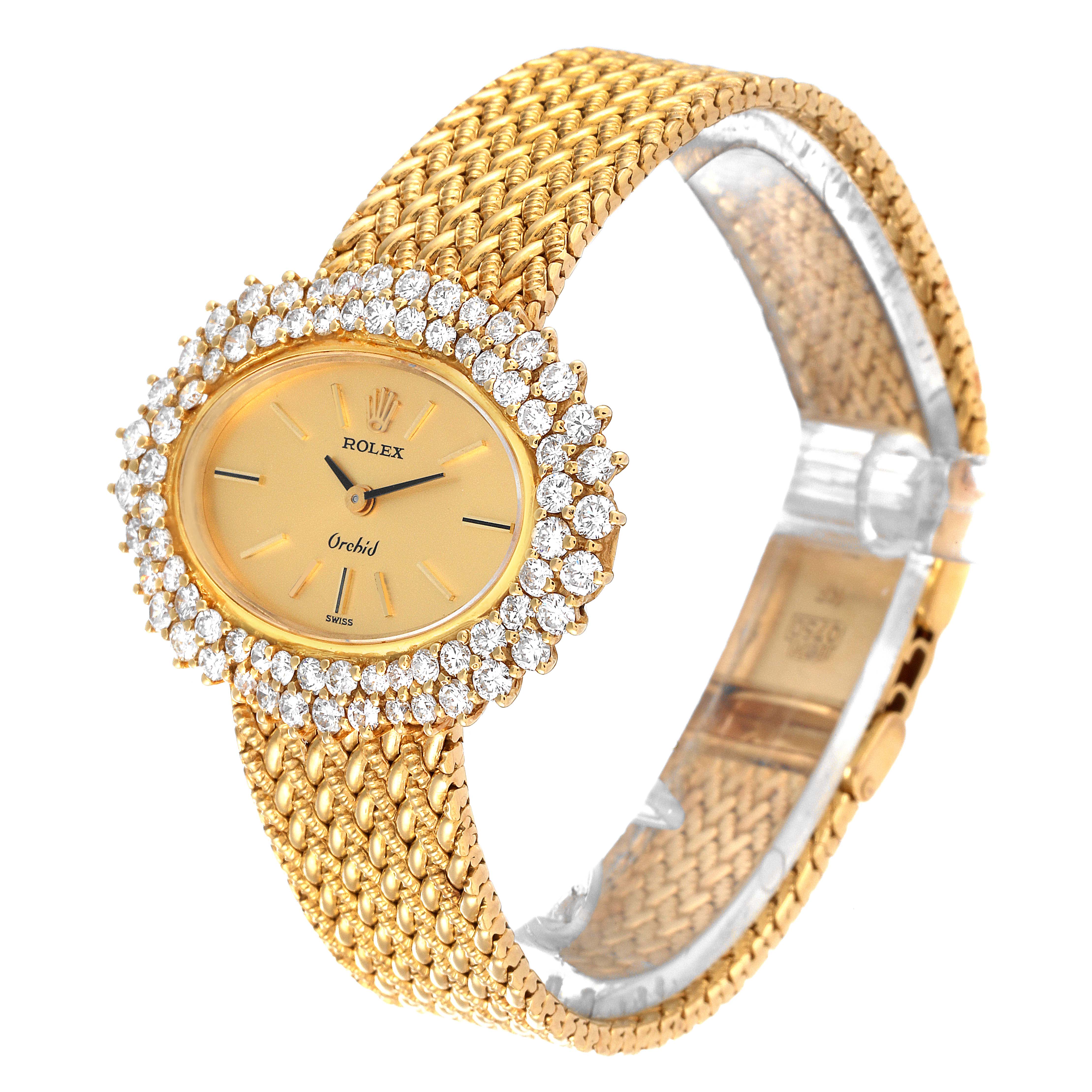 This image shows a side angle of a Rolex Cellini 2674 Women's Yellow Gold Champagne Dial 2674 Women's Yellow Gold Champagne Dial model watch, highlighting its golden band, bejeweled bezel, and oval face.